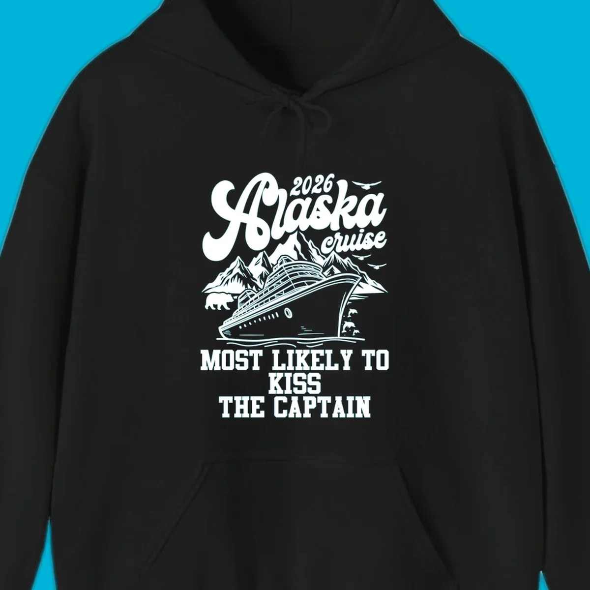 Vintage-style Alaska cruise design with a ship, mountains, bear, and text 'Most Likely To Kiss The Captain'.