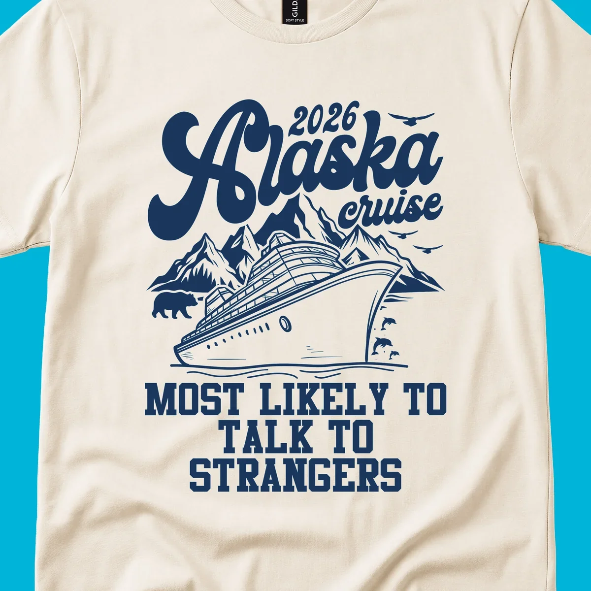A 2026 Alaska cruise design with a ship, mountains, bear, dolphins, and text: Most Likely To Talk To Strangers.