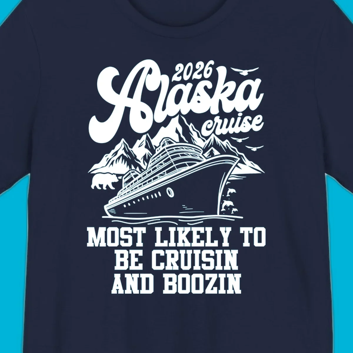 An illustrated white (or dark blue) Alaska cruise ship design with mountains, a bear, and marine life, featuring "alaska-cruisin-boozin" text.