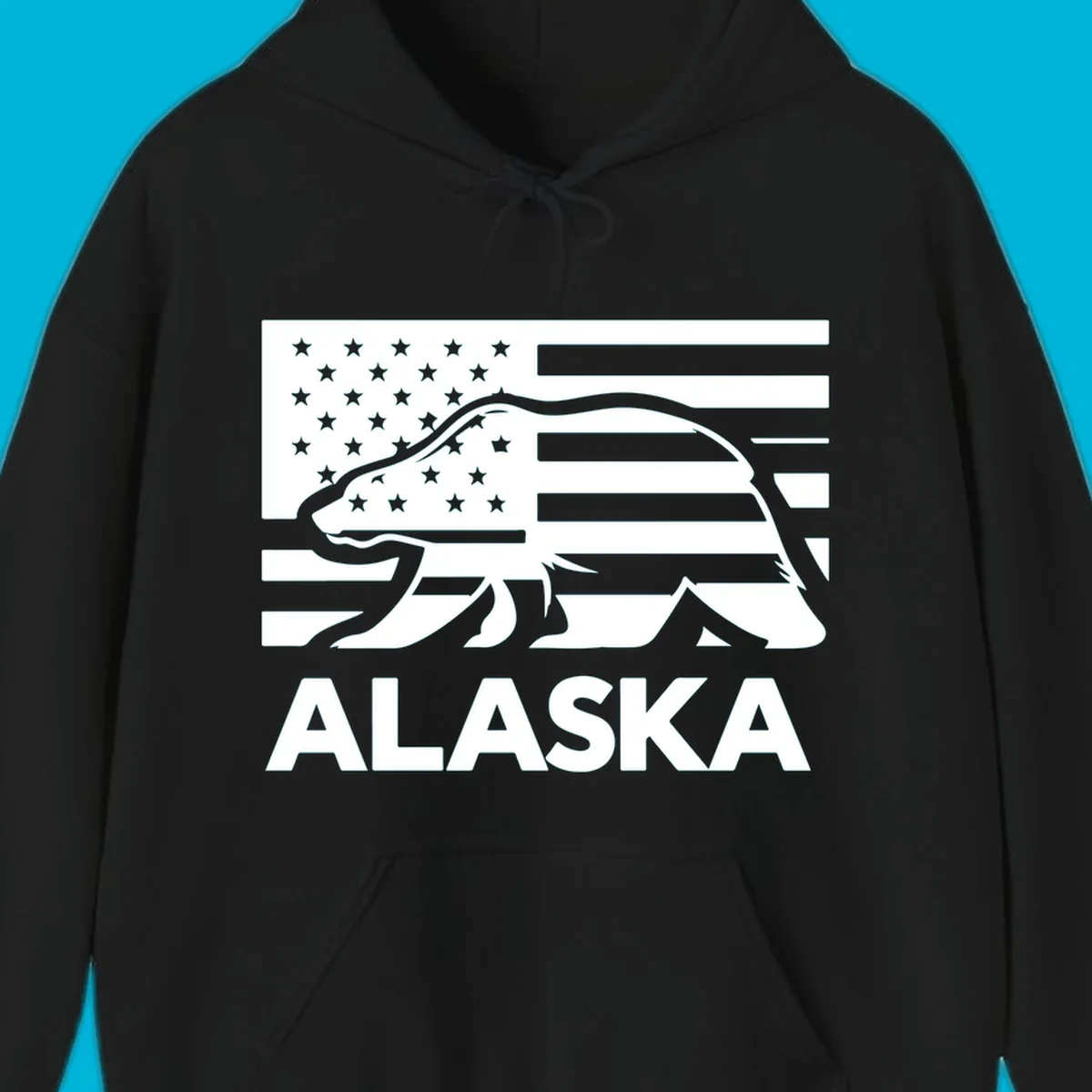 A walking bear silhouette filled with an American flag, with "ALASKA" text below. Features an alaska-bear-flag-silhouette.
