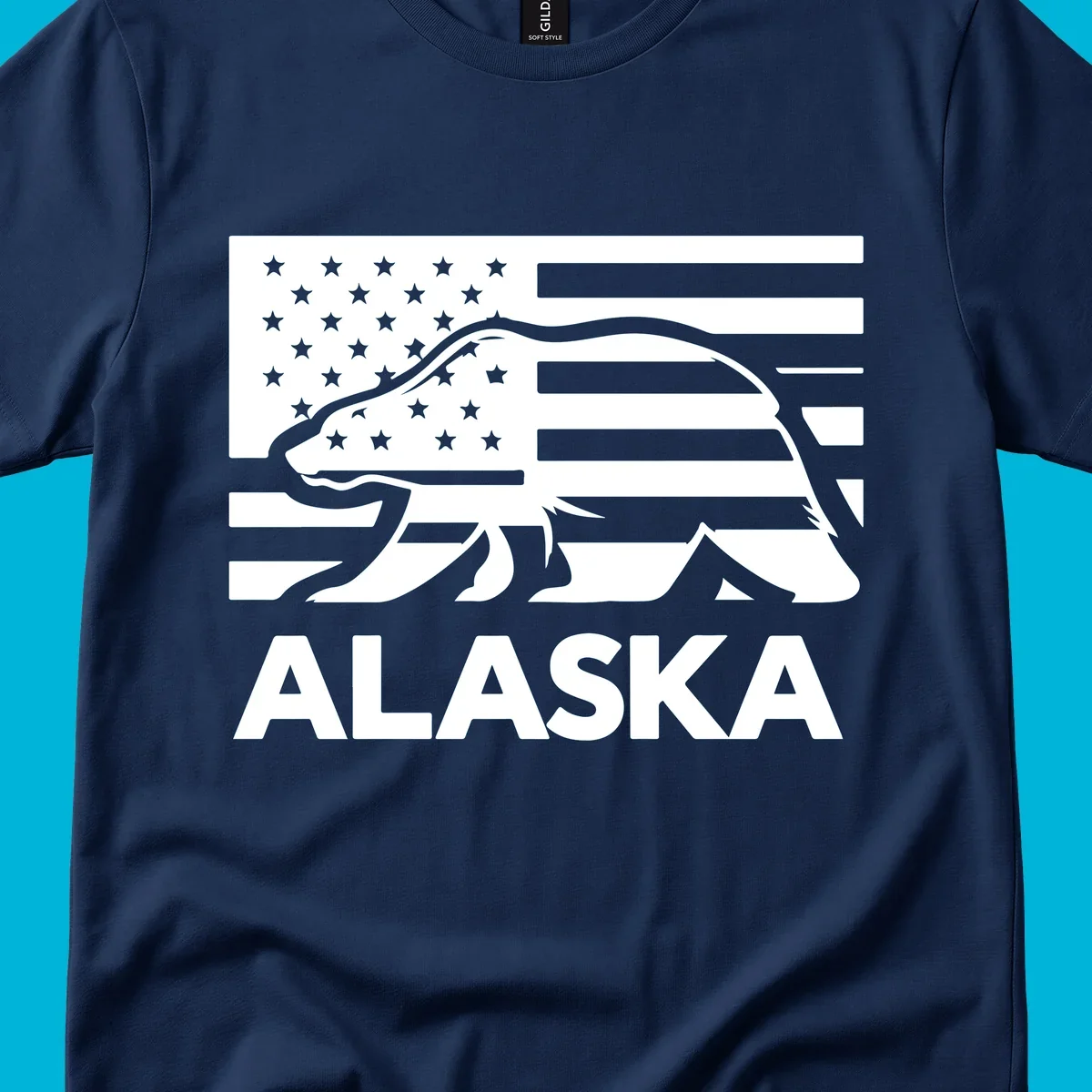 A walking bear silhouette filled with an American flag, with "ALASKA" text below. Features an alaska-bear-flag-silhouette.