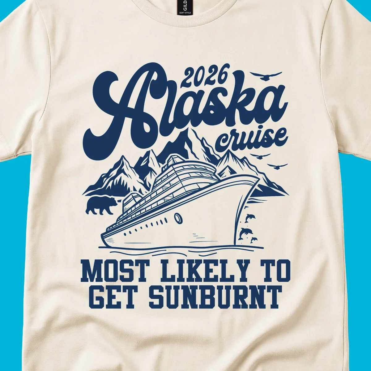 Vintage-style illustration of a cruise ship, mountains, bear, and dolphins with "2026 Alaska cruise MOST LIKELY TO GET SUNBURNT".