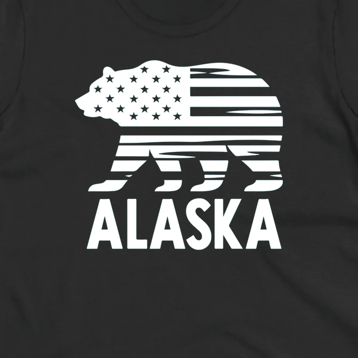 A white bear silhouette filled with the American flag and the text ALASKA. Represents an alaska-flag-bear.