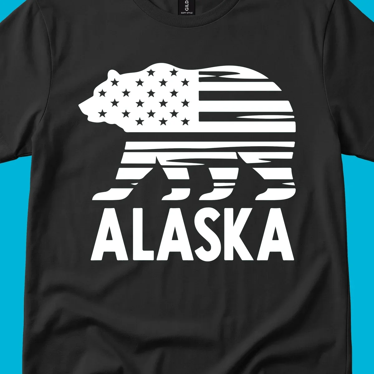 A white bear silhouette filled with the American flag and the text ALASKA. Represents an alaska-flag-bear.