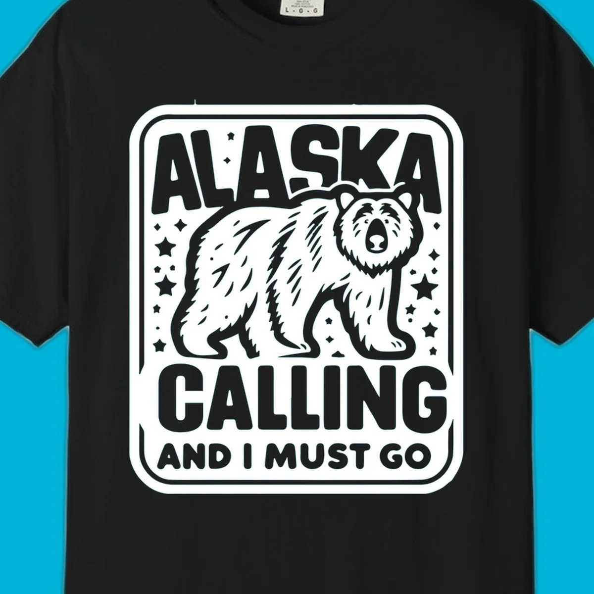 A vintage-style illustration of a bear with stars and the text 'ALASKA CALLING AND I MUST GO'.
