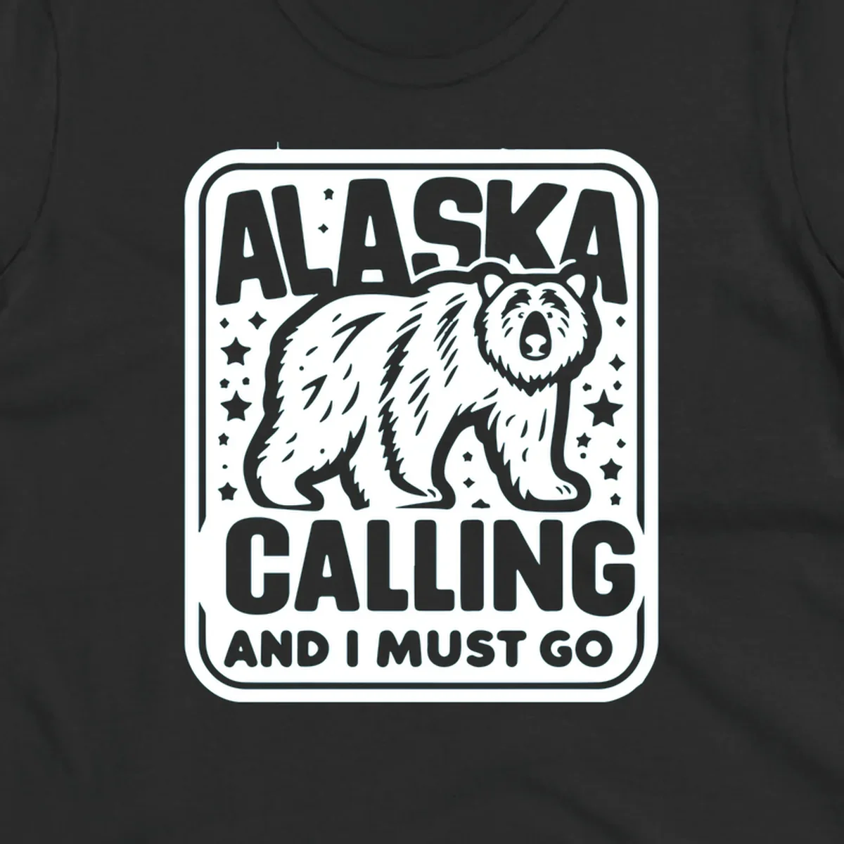 A vintage-style illustration of a bear with stars and the text 'ALASKA CALLING AND I MUST GO'.