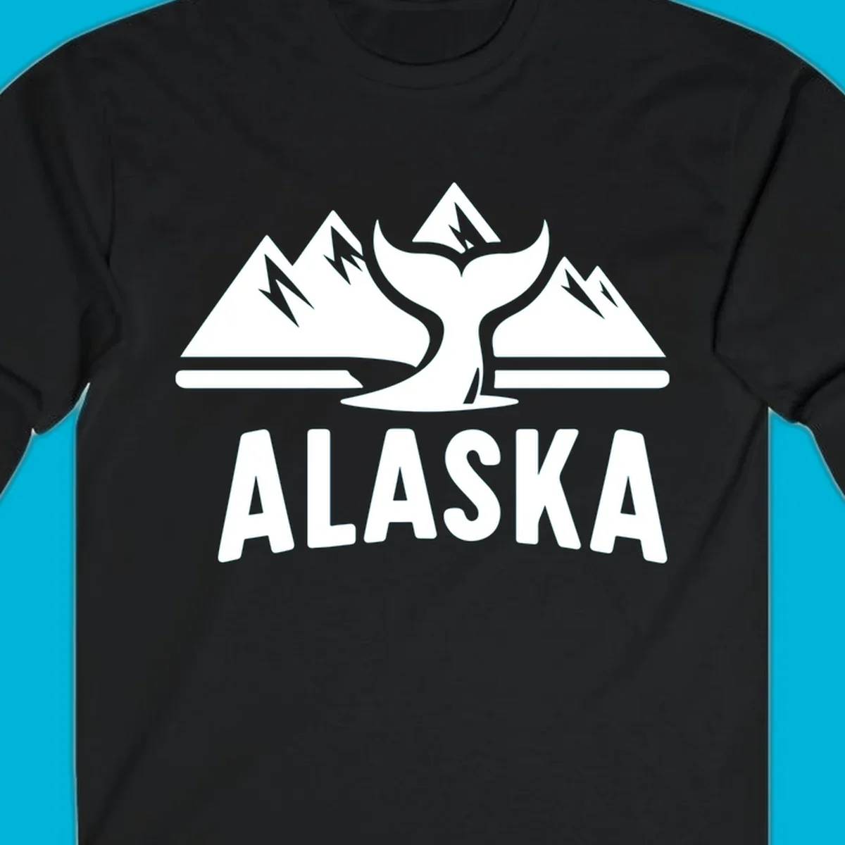 A scenic Alaska mountains whale tail design with three peaks and a whale's fluke above the word ALASKA.