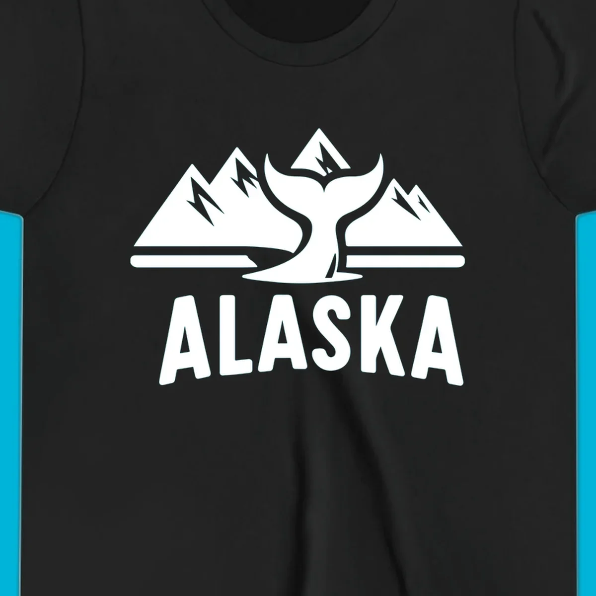 A scenic Alaska mountains whale tail design with three peaks and a whale's fluke above the word ALASKA.