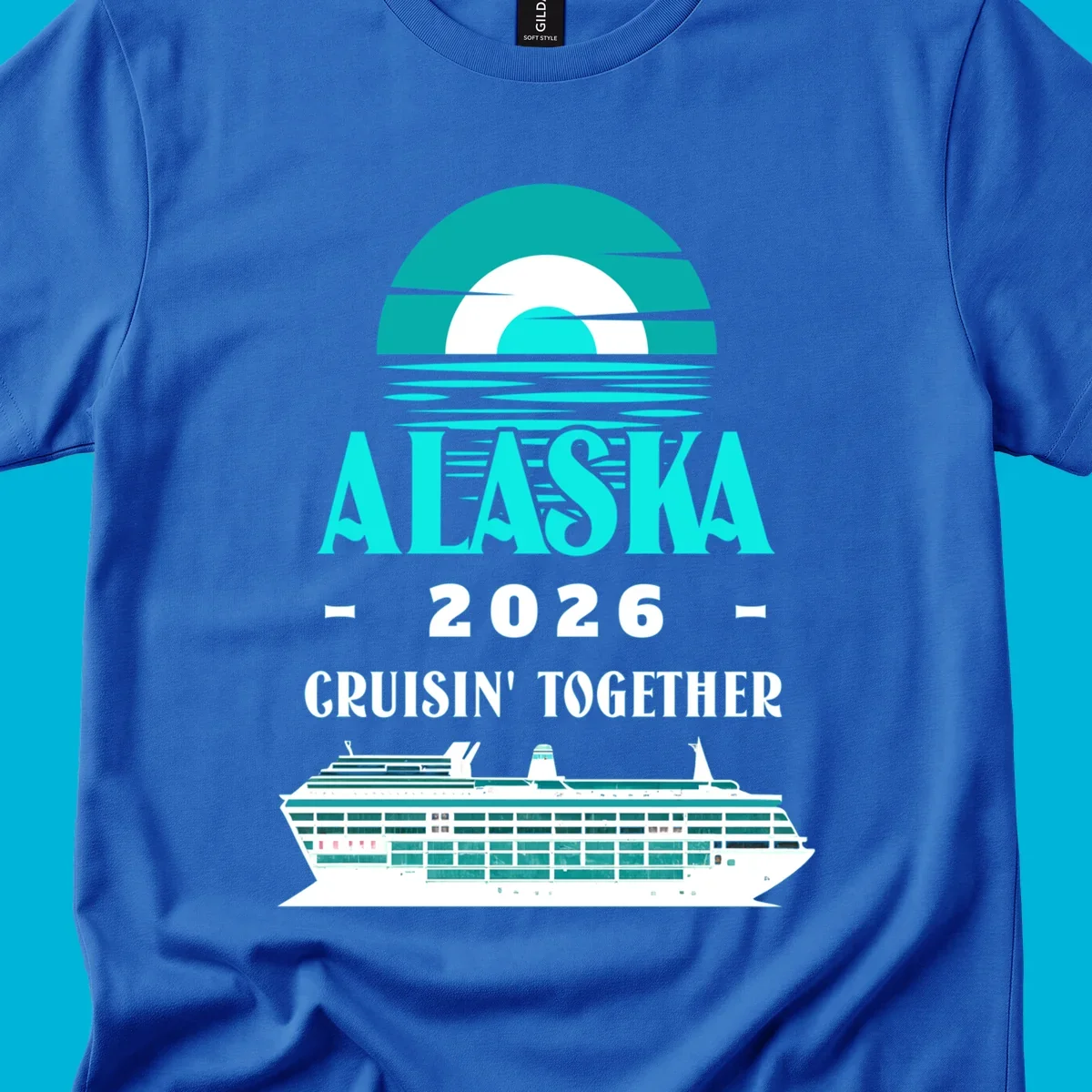 An Alaska Cruisin' Together design with a teal sun, waves, text ALASKA 2026 CRUISIN' TOGETHER, and a cruise ship.