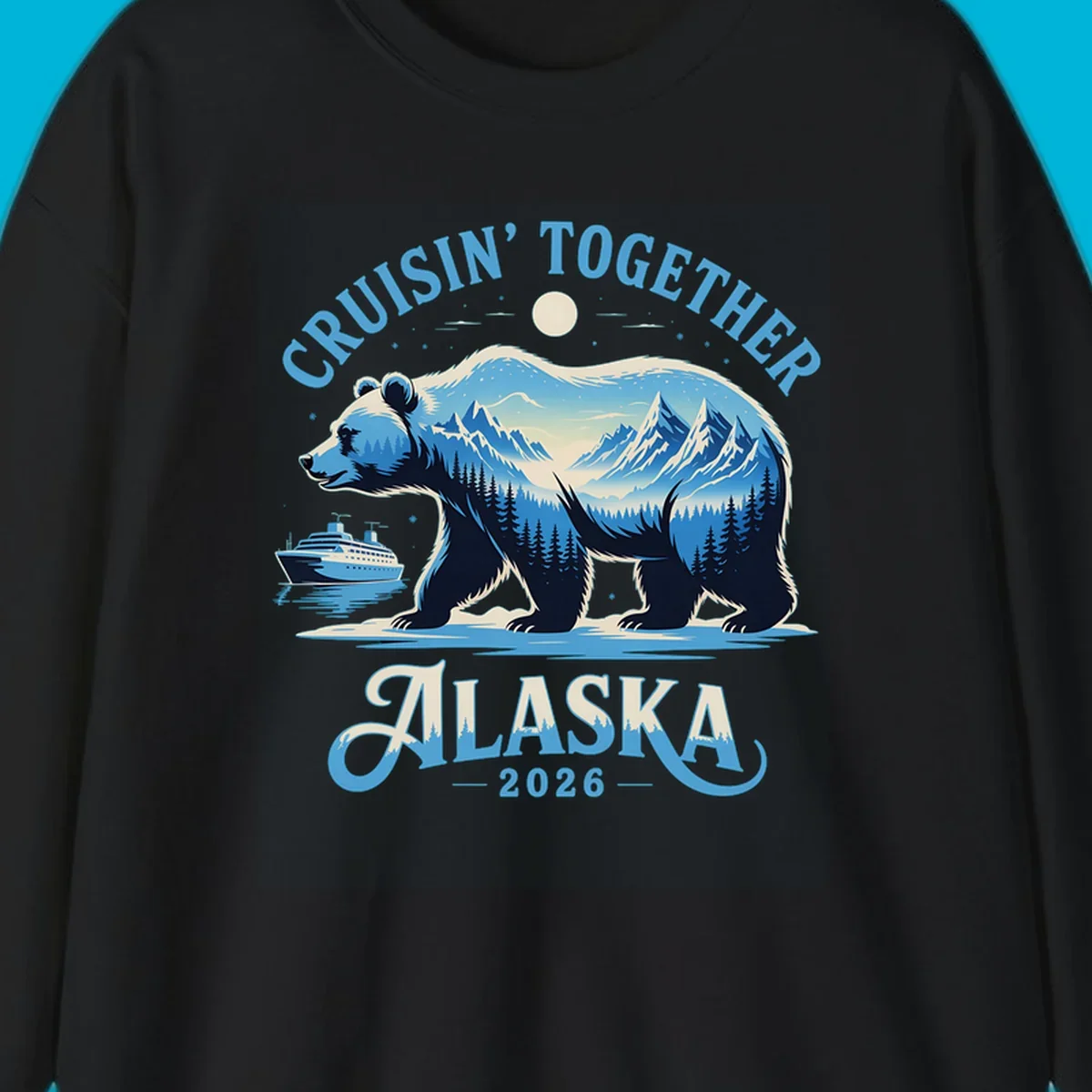 A stylized blue bear with mountains and trees inside its silhouette stands by a cruise ship. Text says 'CRUISIN' TOGETHER ALASKA 2026' for an alaska-cruise-bear-2026 design.