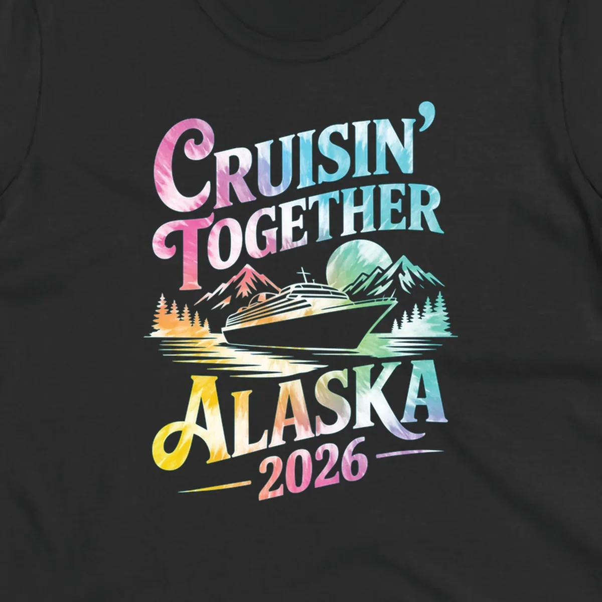 A tie-dye graphic featuring a cruise ship, mountains, and trees, with the text 'CRUISIN' TOGETHER ALASKA 2026'. This alaska-cruise-2026-tie-dye design shows a scenic view.