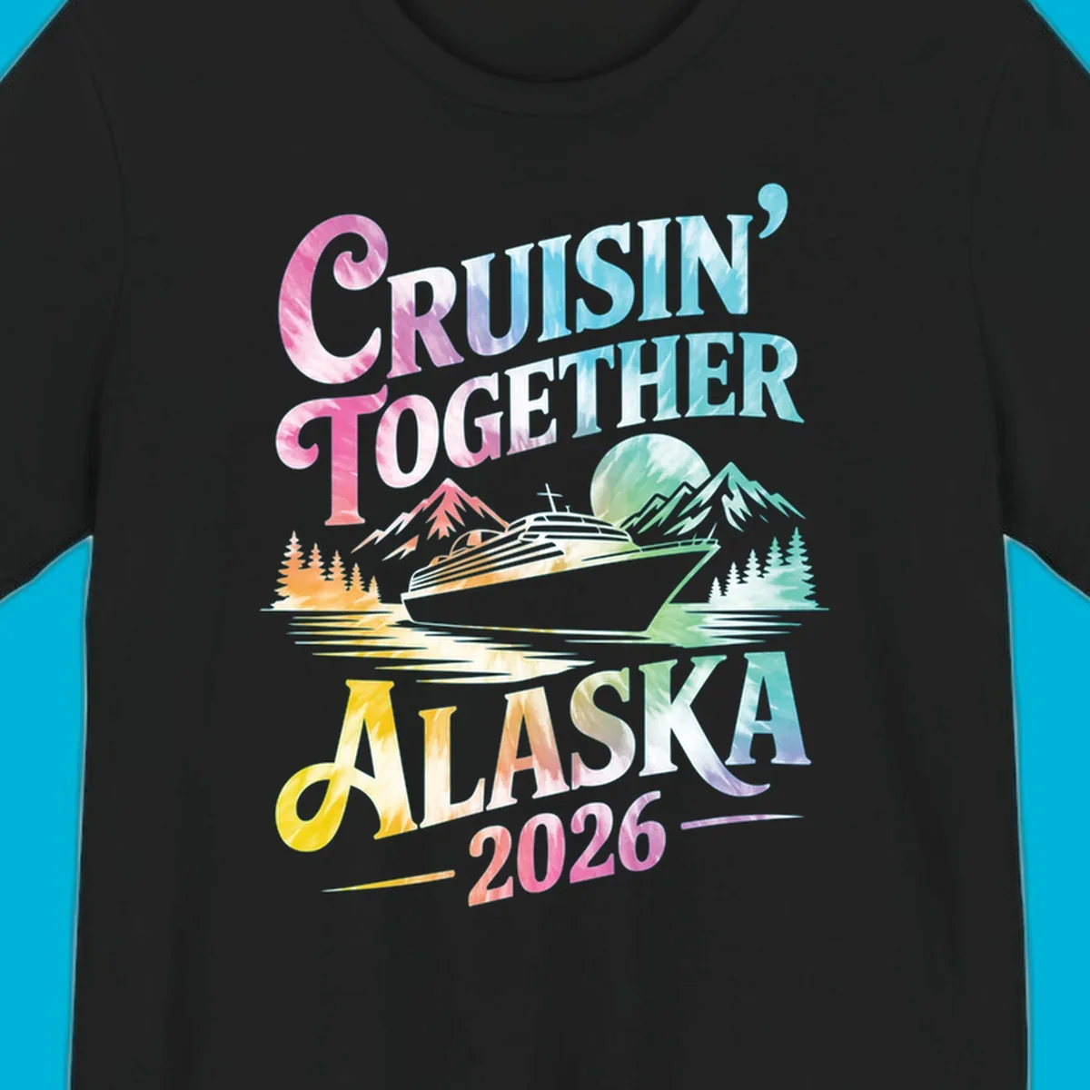 A tie-dye graphic featuring a cruise ship, mountains, and trees, with the text 'CRUISIN' TOGETHER ALASKA 2026'. This alaska-cruise-2026-tie-dye design shows a scenic view.