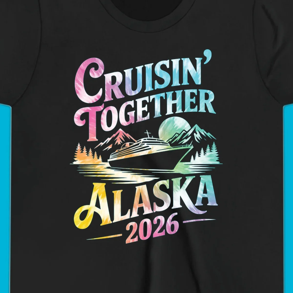 A tie-dye graphic featuring a cruise ship, mountains, and trees, with the text 'CRUISIN' TOGETHER ALASKA 2026'. This alaska-cruise-2026-tie-dye design shows a scenic view.