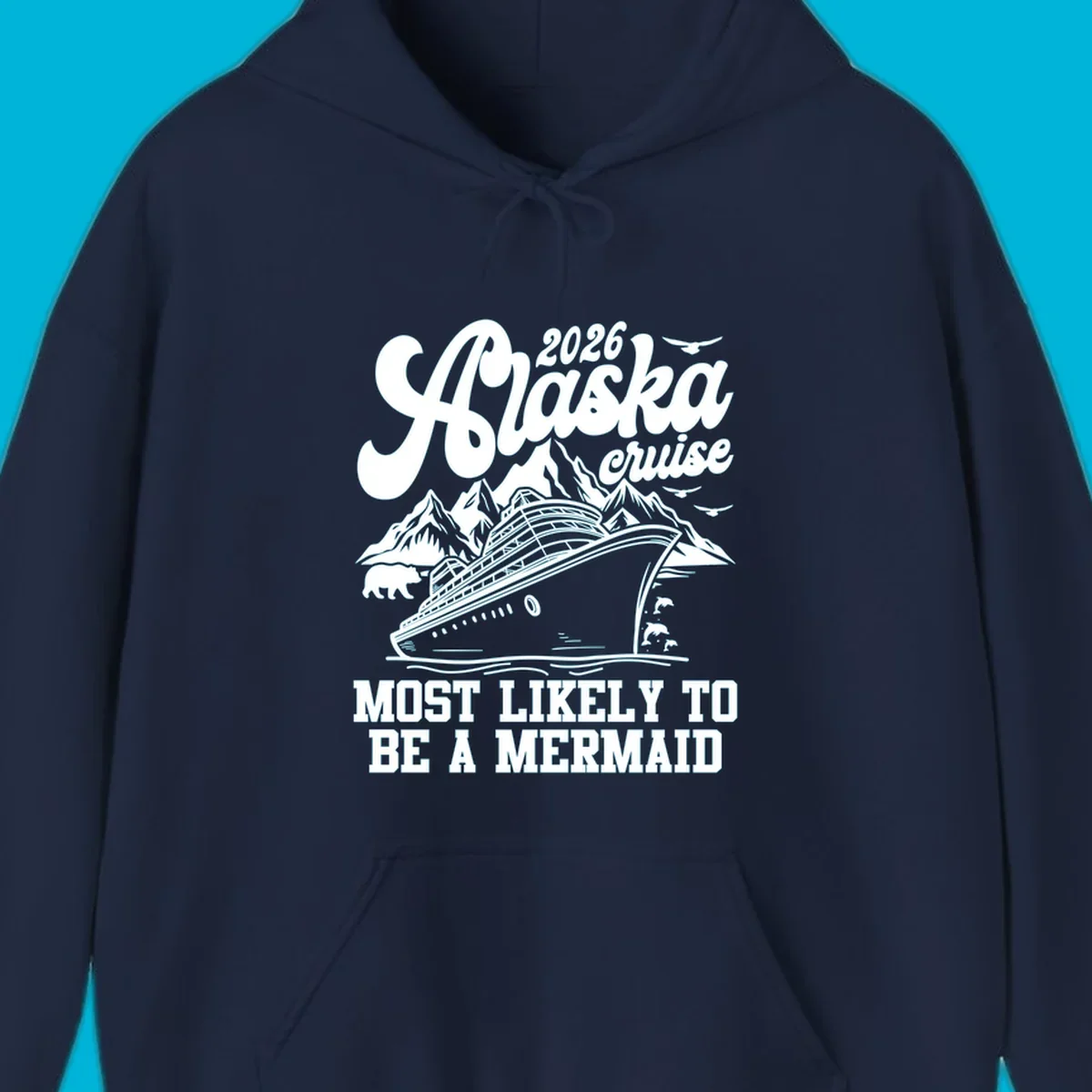 Vintage-style 2026 Alaska cruise design with a ship, mountains, bear, dolphins, and text "Most Likely To Be A Mermaid".