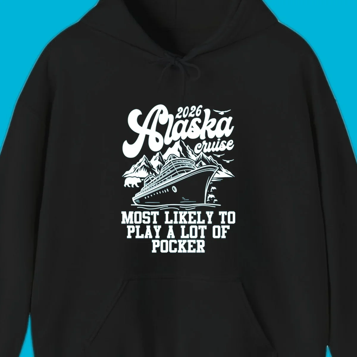 White (or navy) 2026 Alaska cruise design with a ship, mountains, bear, dolphins, and text: "MOST LIKELY TO PLAY A LOT OF POCKER".