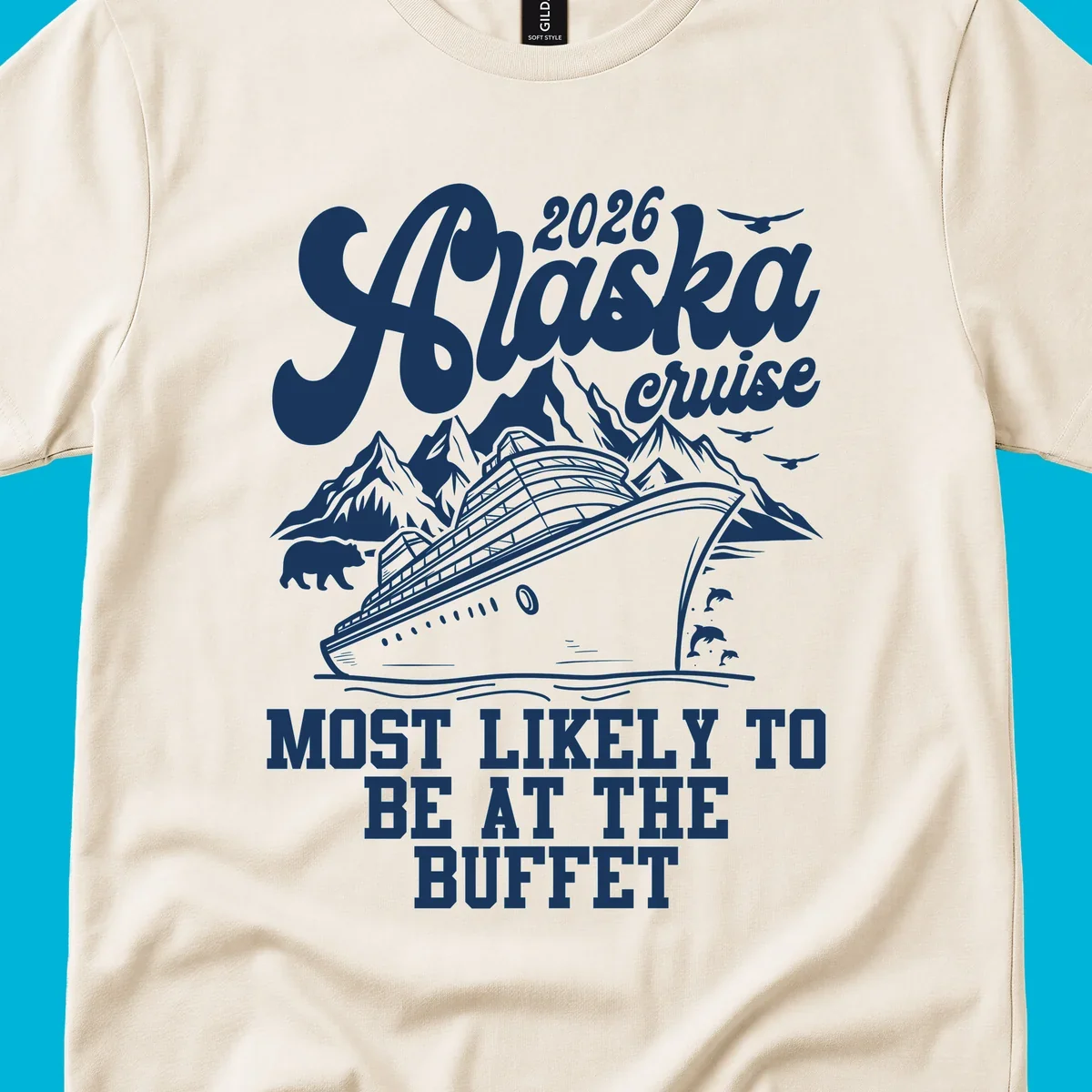 A white illustration shows a cruise ship, mountains, a bear, and dolphins, with text "2026 Alaska cruise MOST LIKELY TO BE AT THE BUFFET." This represents the alaska-cruise-buffet-likely concept.