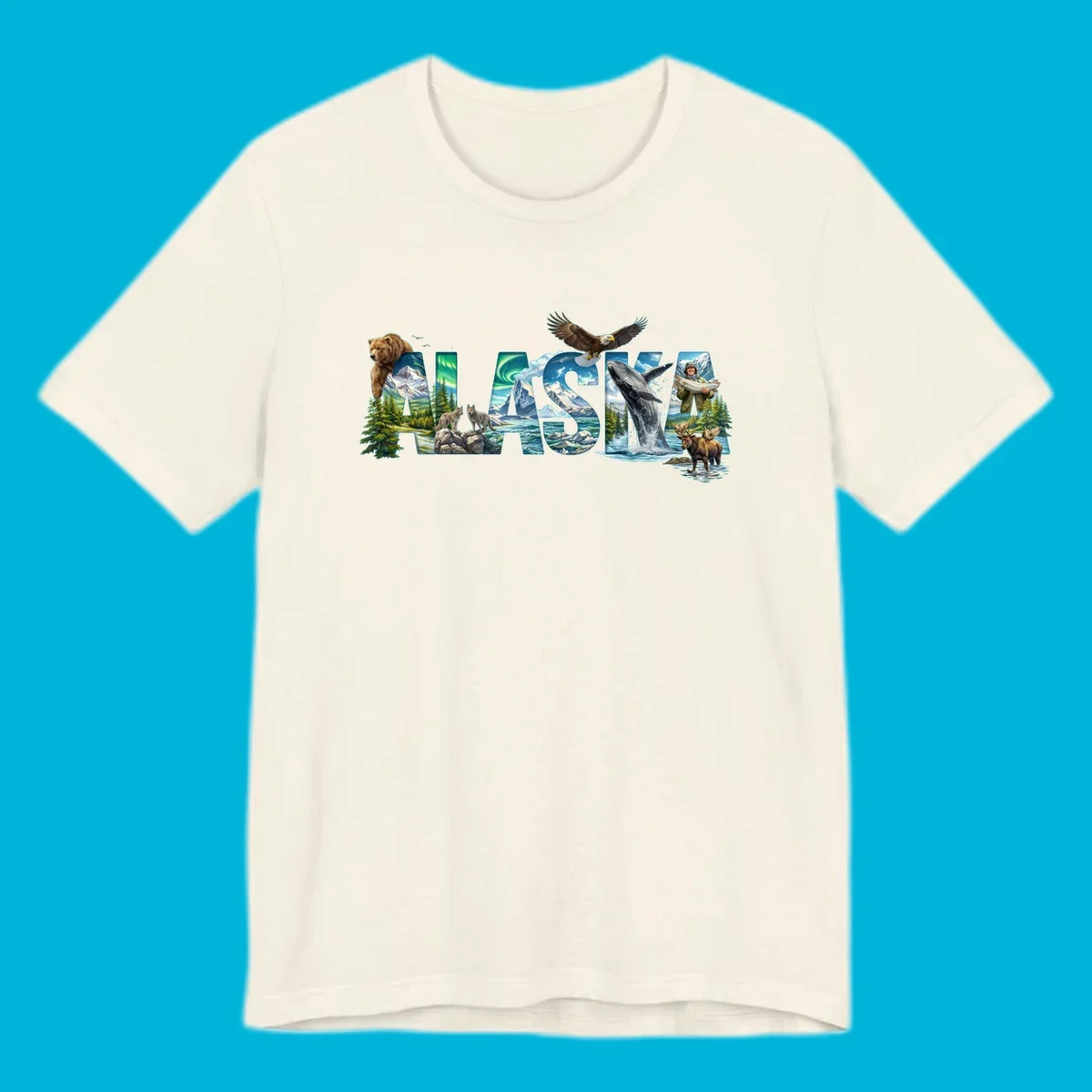 An illustrated text design spelling "ALASKA" with images of a grizzly, mountains, northern lights, wolves, ocean, bald eagle, whale, fisherman, and moose. This alaska-wildlife-scenic-text design captures the state's natural beauty.