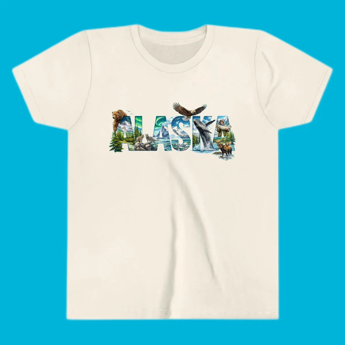 An illustrated text design spelling "ALASKA" with images of a grizzly, mountains, northern lights, wolves, ocean, bald eagle, whale, fisherman, and moose. This alaska-wildlife-scenic-text design captures the state's natural beauty.