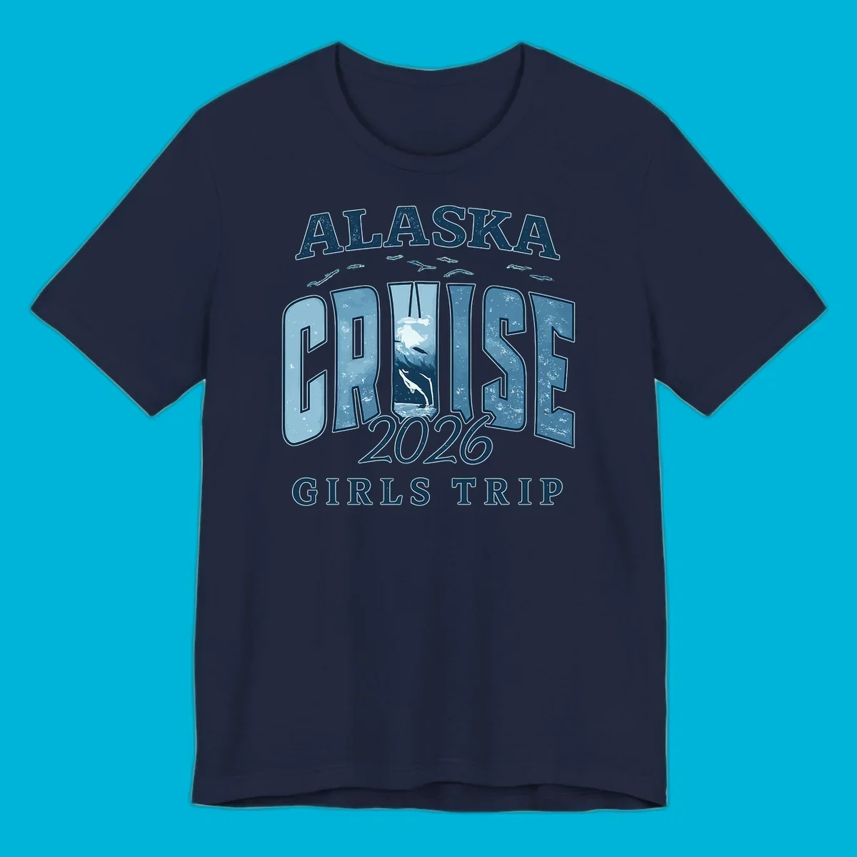 Alaska Cruise 2026 Girls Trip design with whales jumping and swimming within the letters of CRUISE, set against distressed blue text.