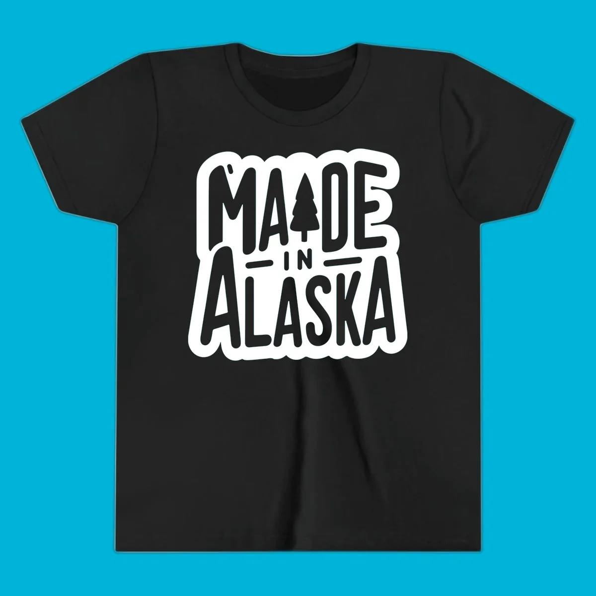 Stylized 'MADE IN ALASKA' text with a pine tree silhouette. A made-in-alaska-tree design.