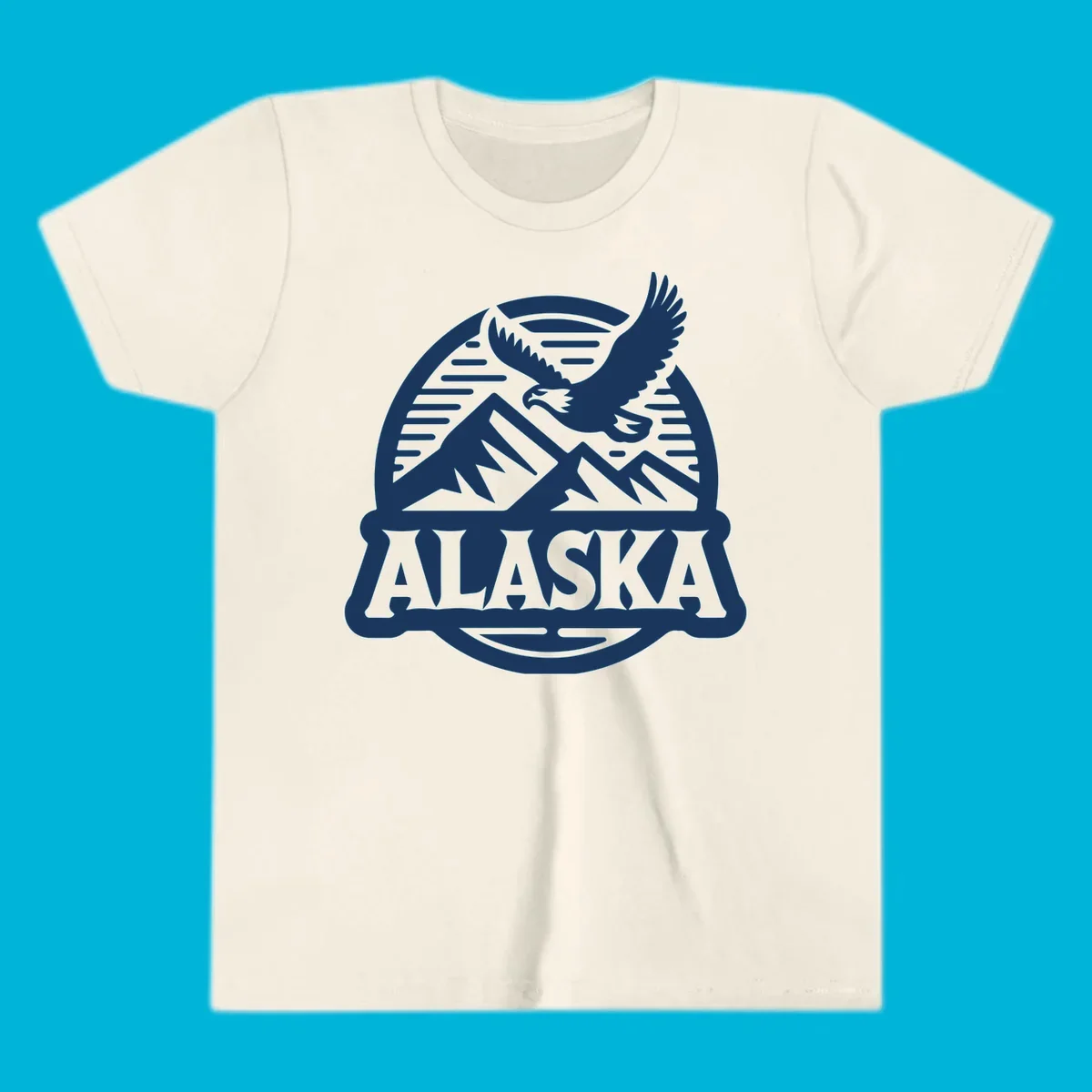 Vintage Alaska badge design with a flying eagle over mountains and 'ALASKA' text in a banner.