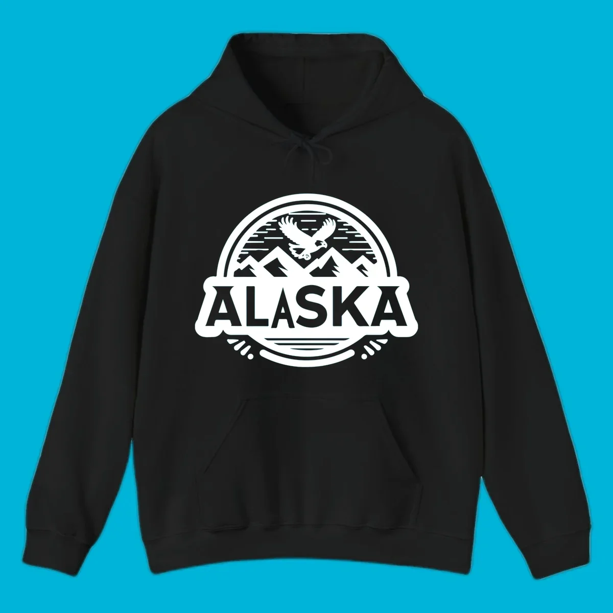 An oval badge design with a bald eagle flying above mountains and water, and the word ALASKA in bold text; alaska-eagle-mountain-badge.