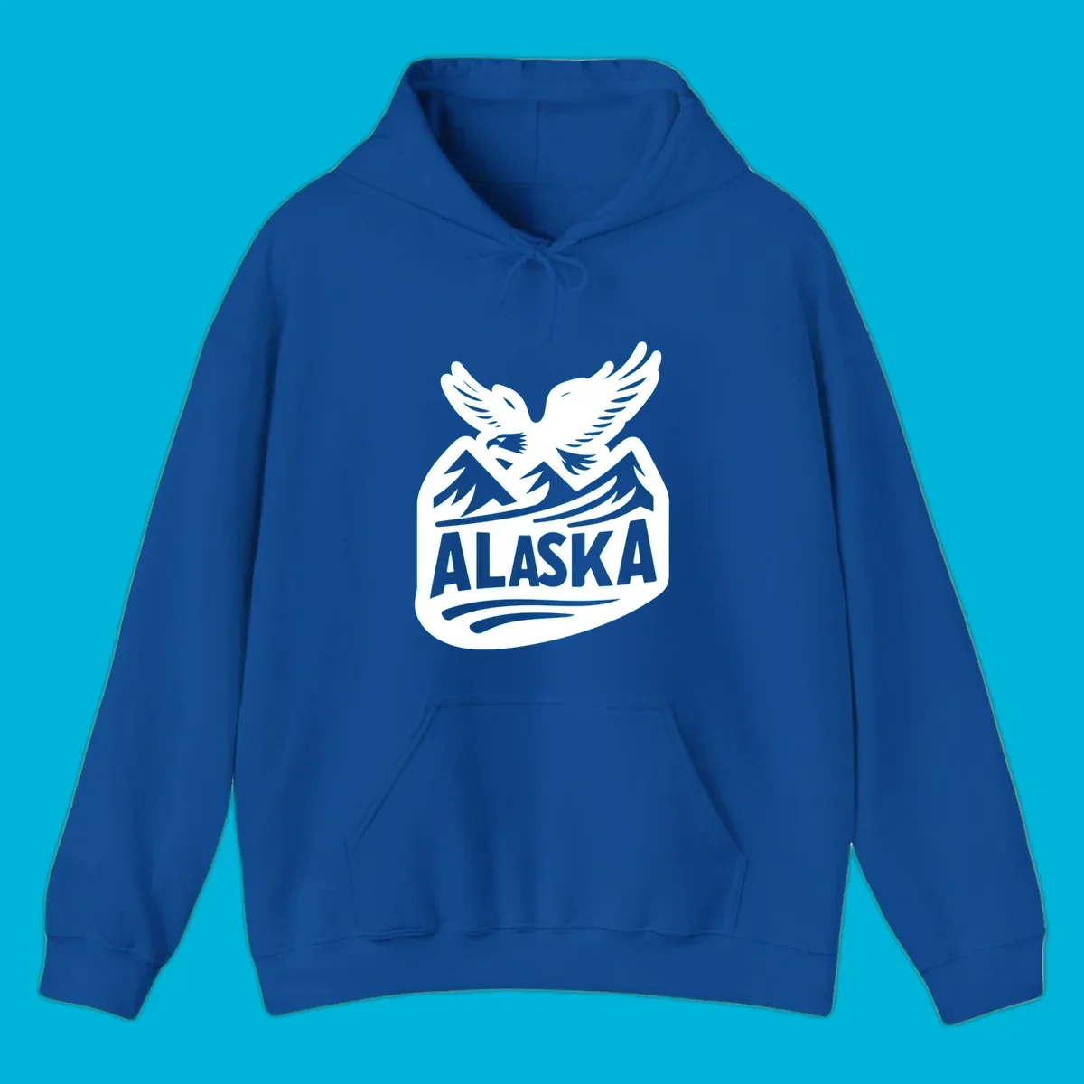 A white and dark blue badge design showing a flying eagle over mountain peaks with "ALASKA" text, for a cruise souvenir.