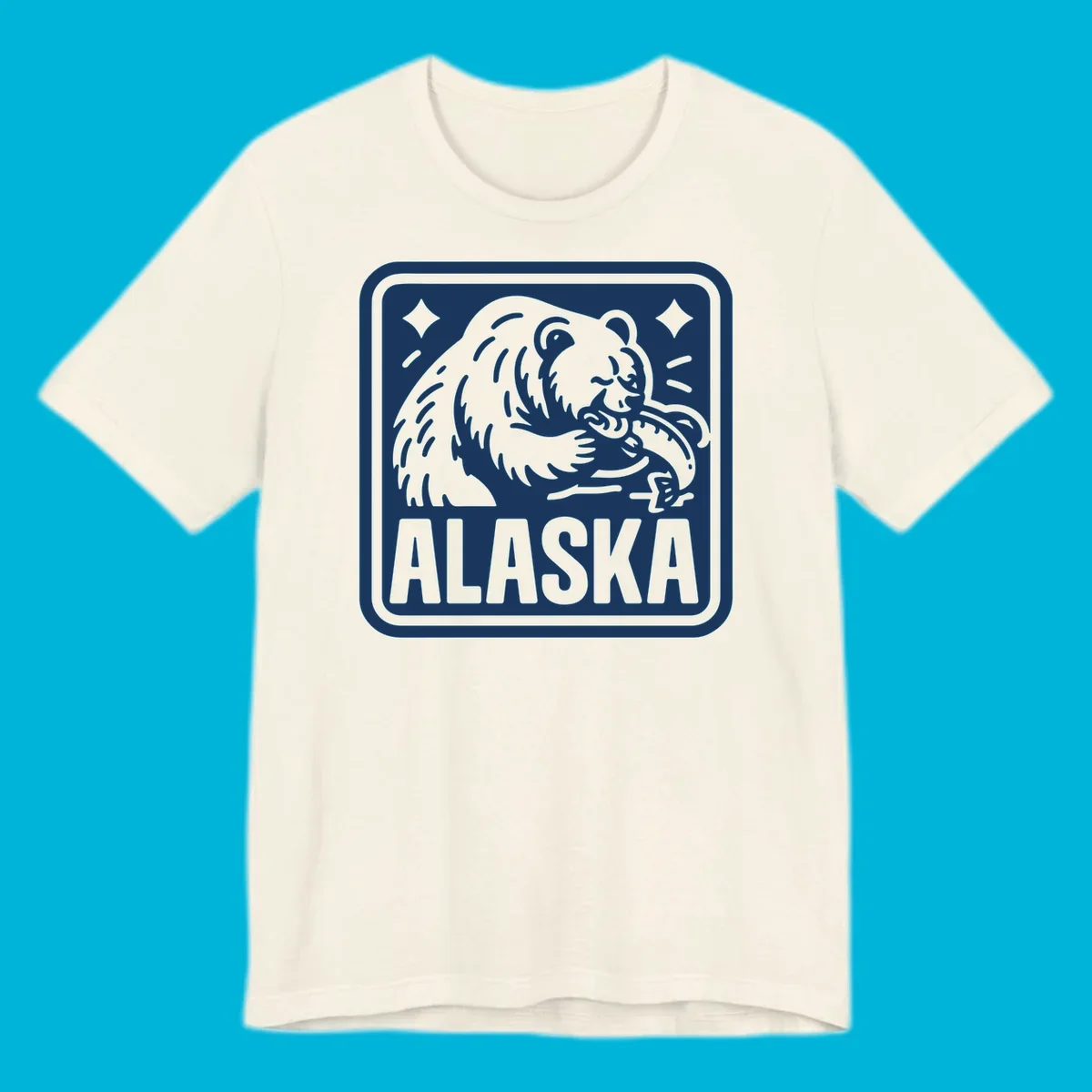 A white alaskan grizzly salmon fishing illustration within a rectangular badge, with 'ALASKA' text.