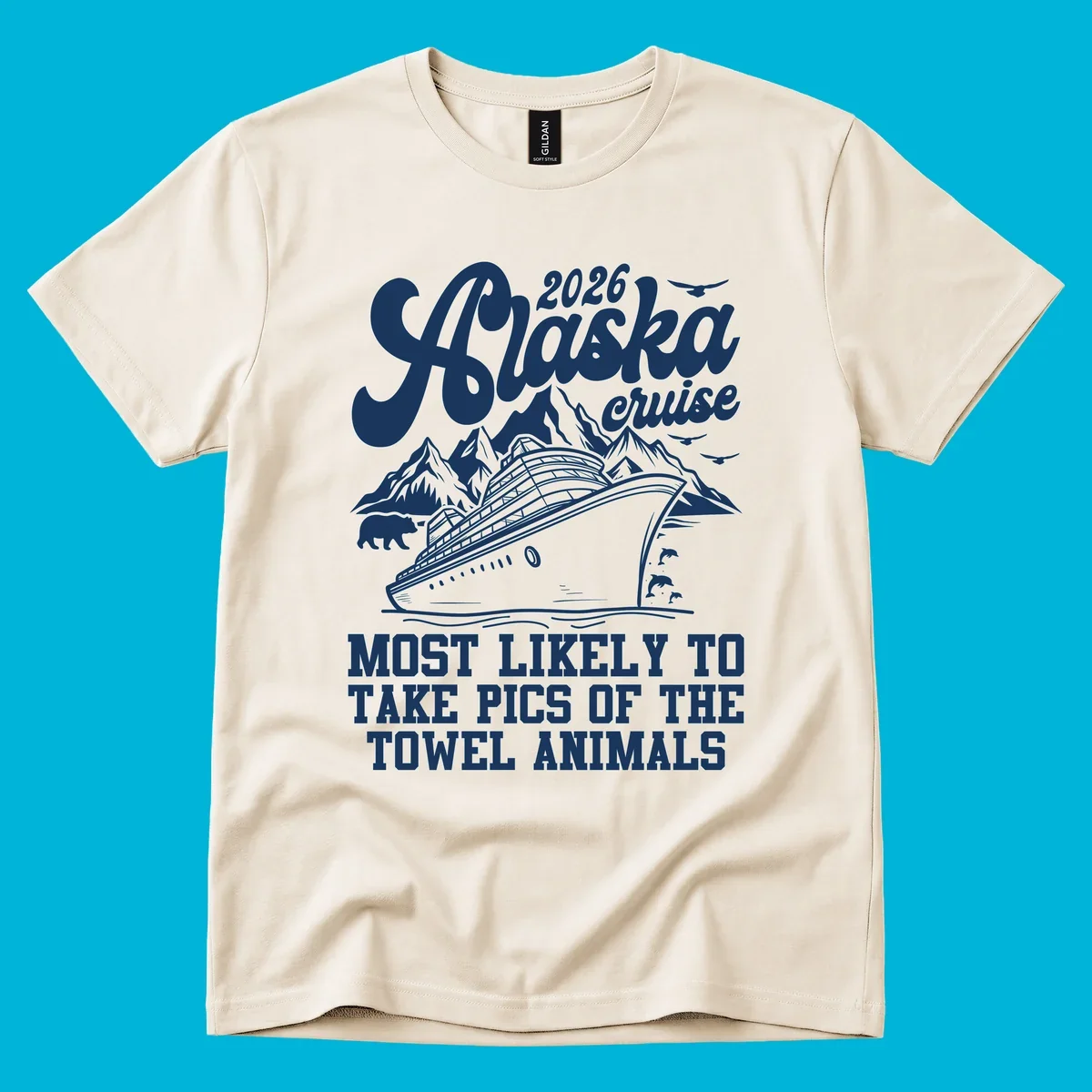 Illustrated design for 2026 Alaska cruise with a ship, mountains, bear, dolphins, and text about taking pics of towel animals.