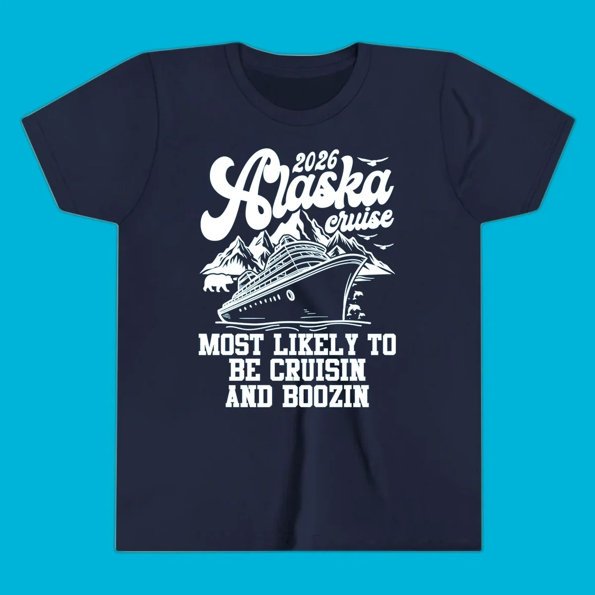 An illustrated white (or dark blue) Alaska cruise ship design with mountains, a bear, and marine life, featuring "alaska-cruisin-boozin" text.