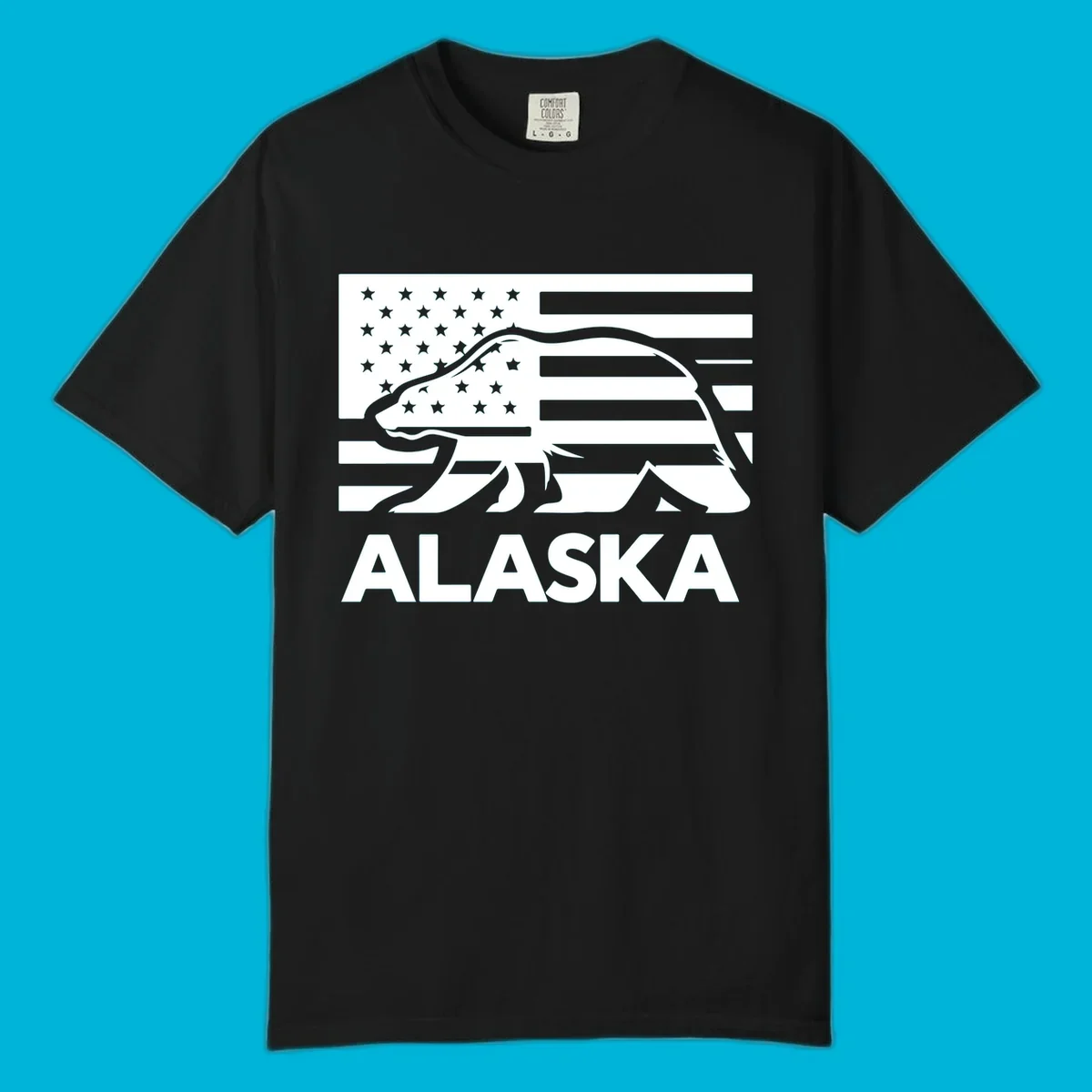 A walking bear silhouette filled with an American flag, with "ALASKA" text below. Features an alaska-bear-flag-silhouette.