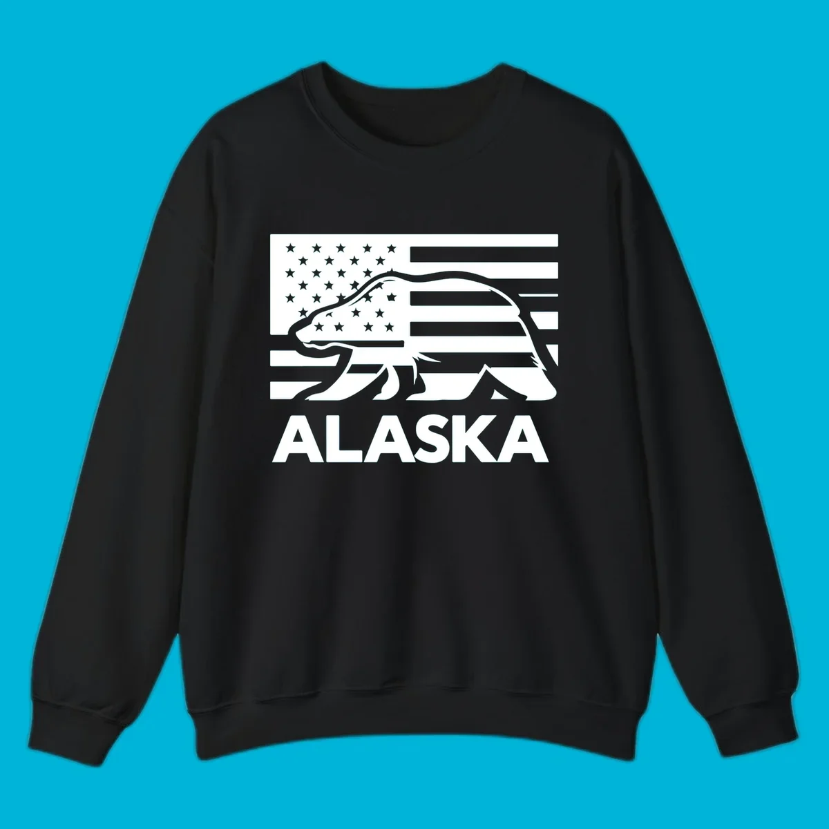 A walking bear silhouette filled with an American flag, with "ALASKA" text below. Features an alaska-bear-flag-silhouette.