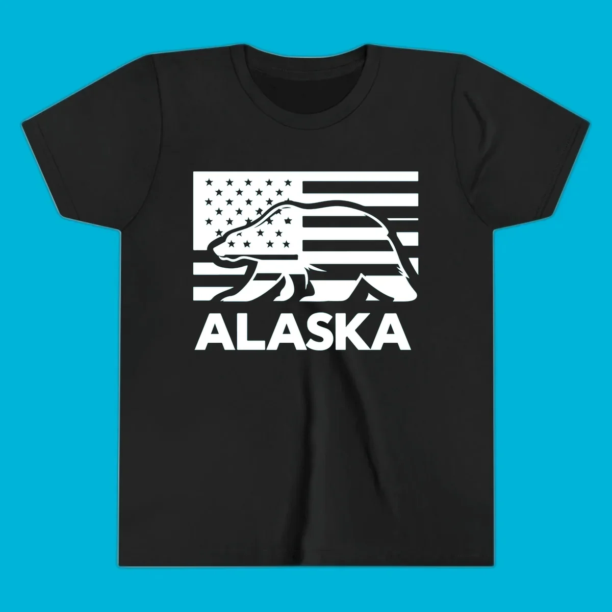 A walking bear silhouette filled with an American flag, with "ALASKA" text below. Features an alaska-bear-flag-silhouette.