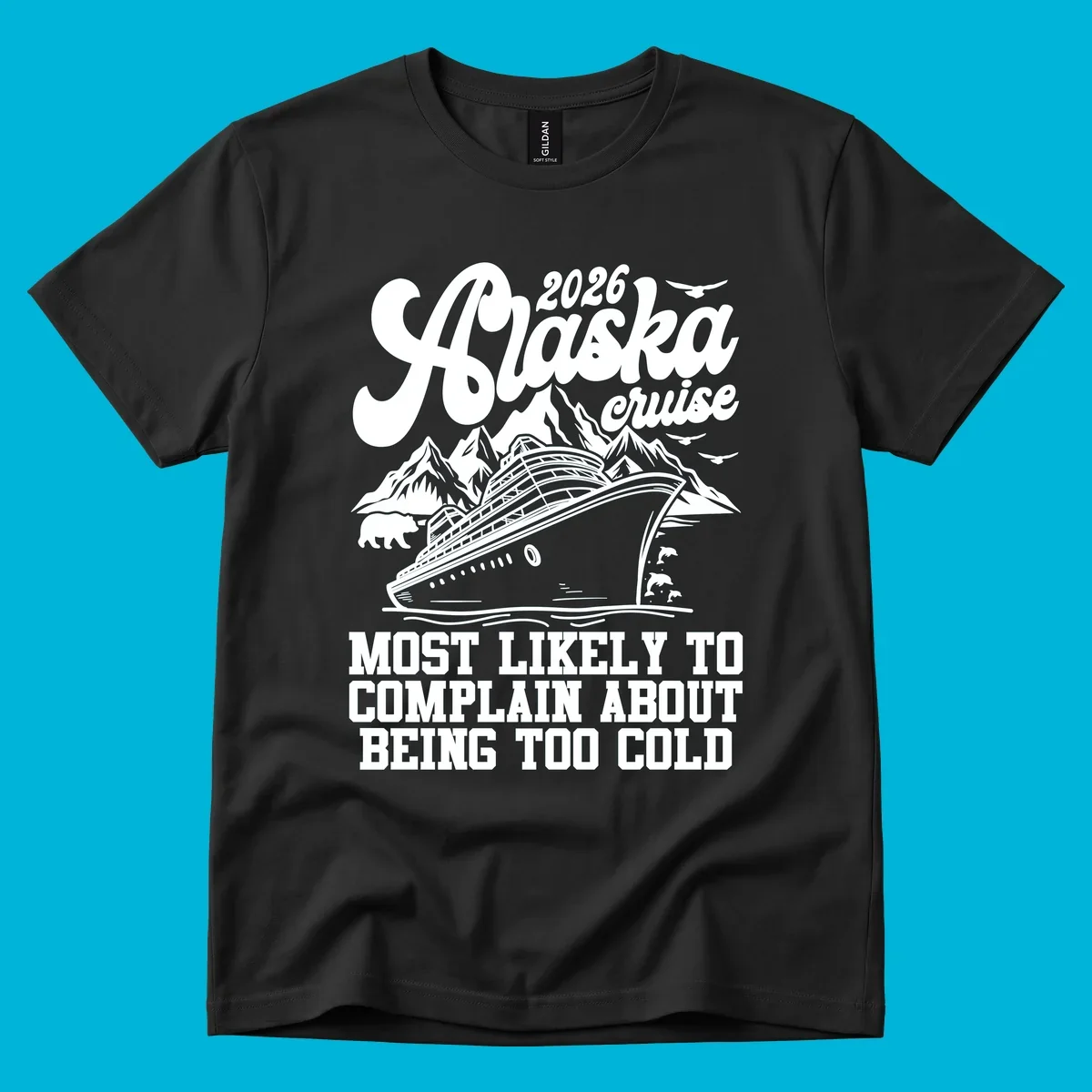 A white design on a black background of a cruise ship, mountains, bear, dolphins, and text "2026 Alaska cruise MOST LIKELY TO COMPLAIN ABOUT BEING TOO COLD".