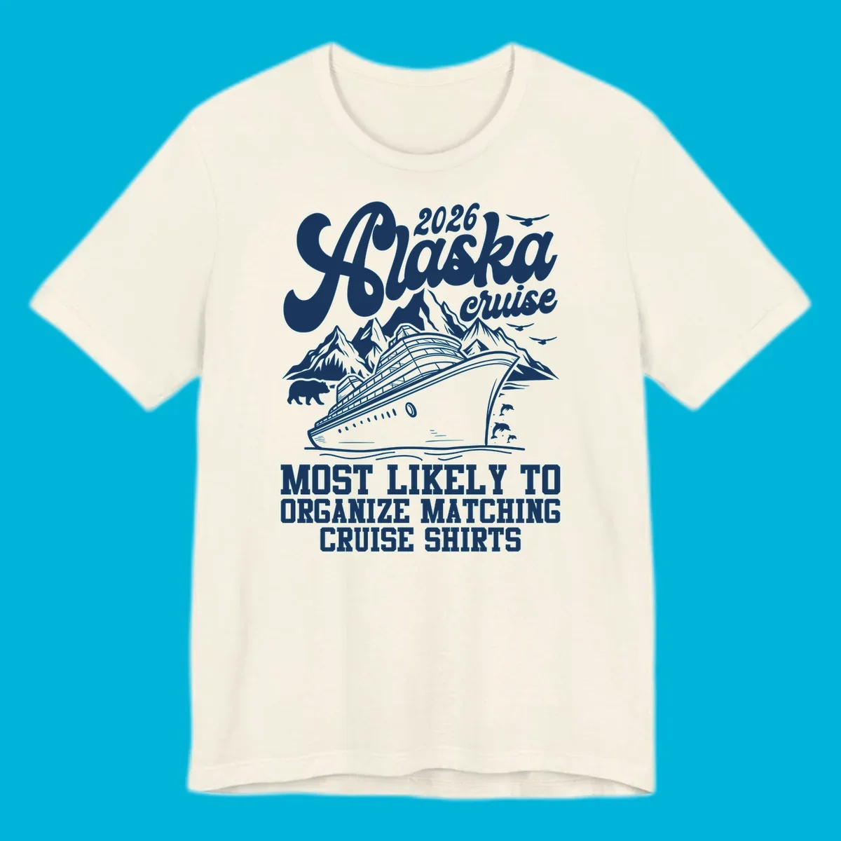 A graphic for a 2026 Alaska cruise featuring a ship, mountains, bear, dolphins, birds, and text 'Most Likely To Organize Matching Cruise Shirts'.