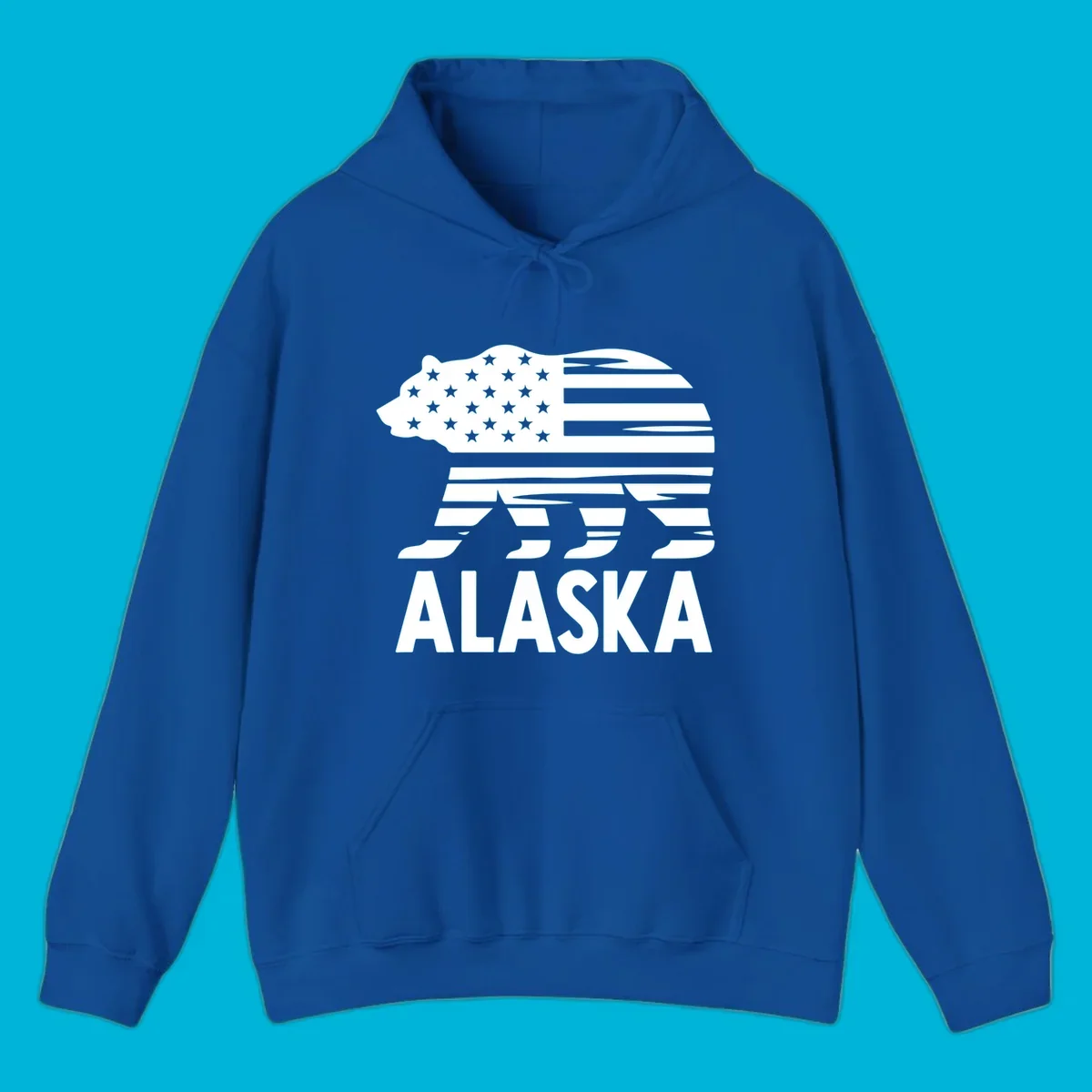 A white bear silhouette filled with the American flag and the text ALASKA. Represents an alaska-flag-bear.
