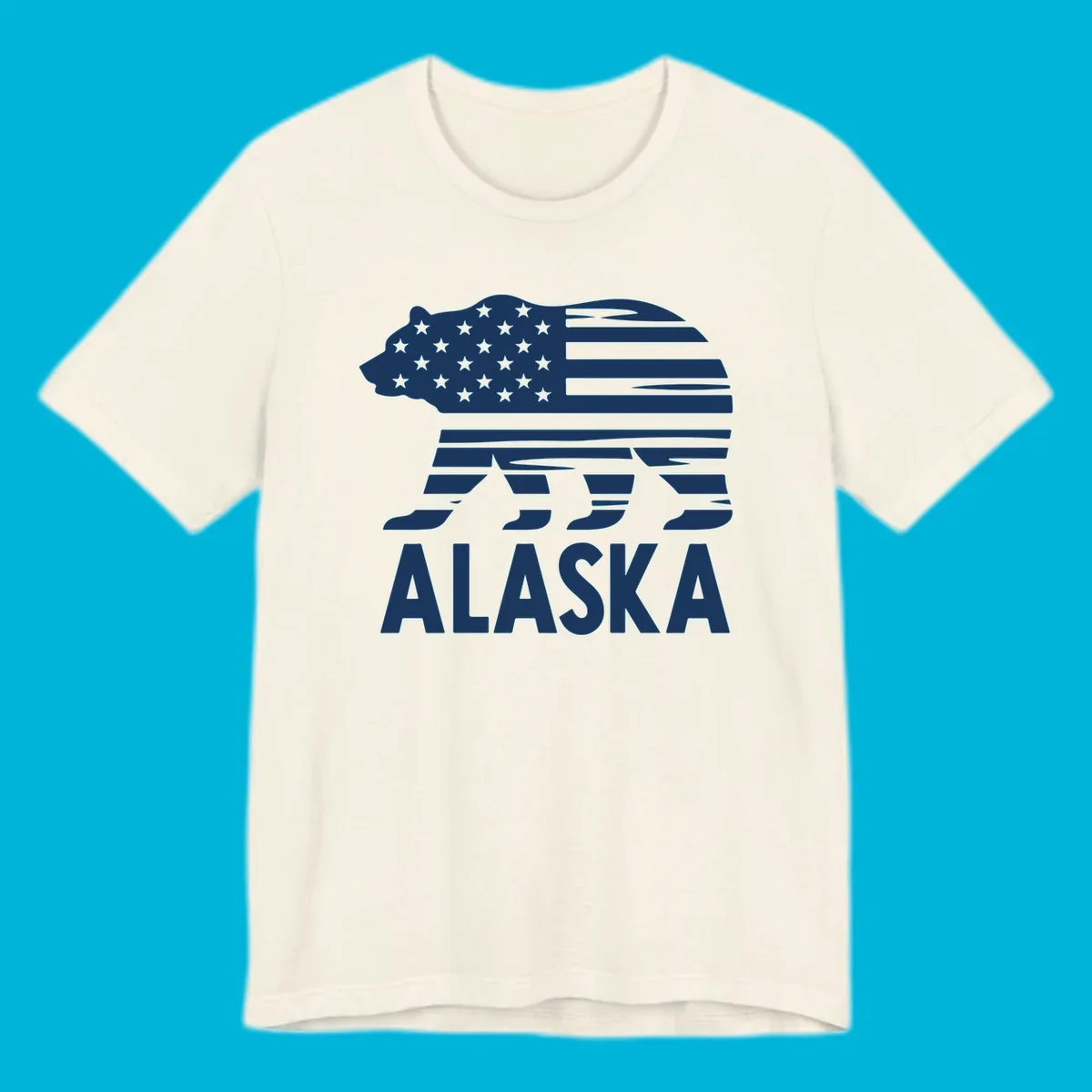 A white bear silhouette filled with the American flag and the text ALASKA. Represents an alaska-flag-bear.