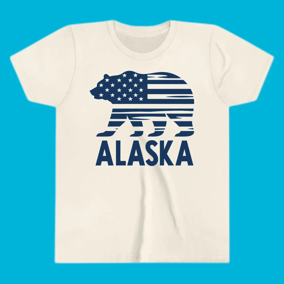 A white bear silhouette filled with the American flag and the text ALASKA. Represents an alaska-flag-bear.