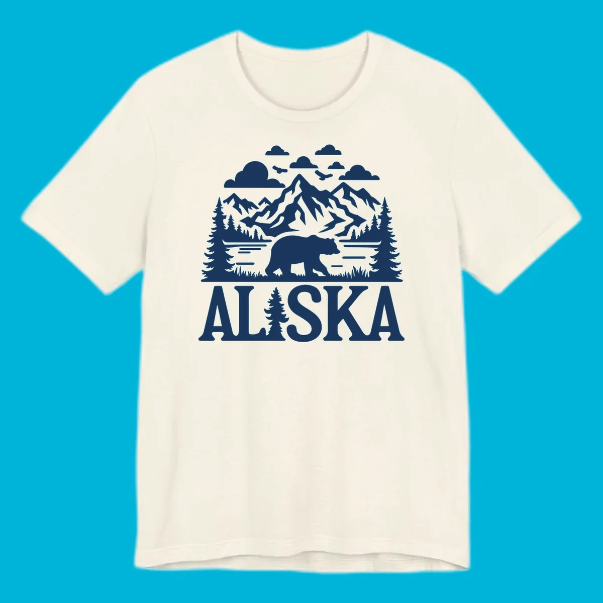 Graphic of an alaska-bear-mountain-view with a bear, mountains, forest, a lake, clouds, and birds, with 'ALASKA' text.