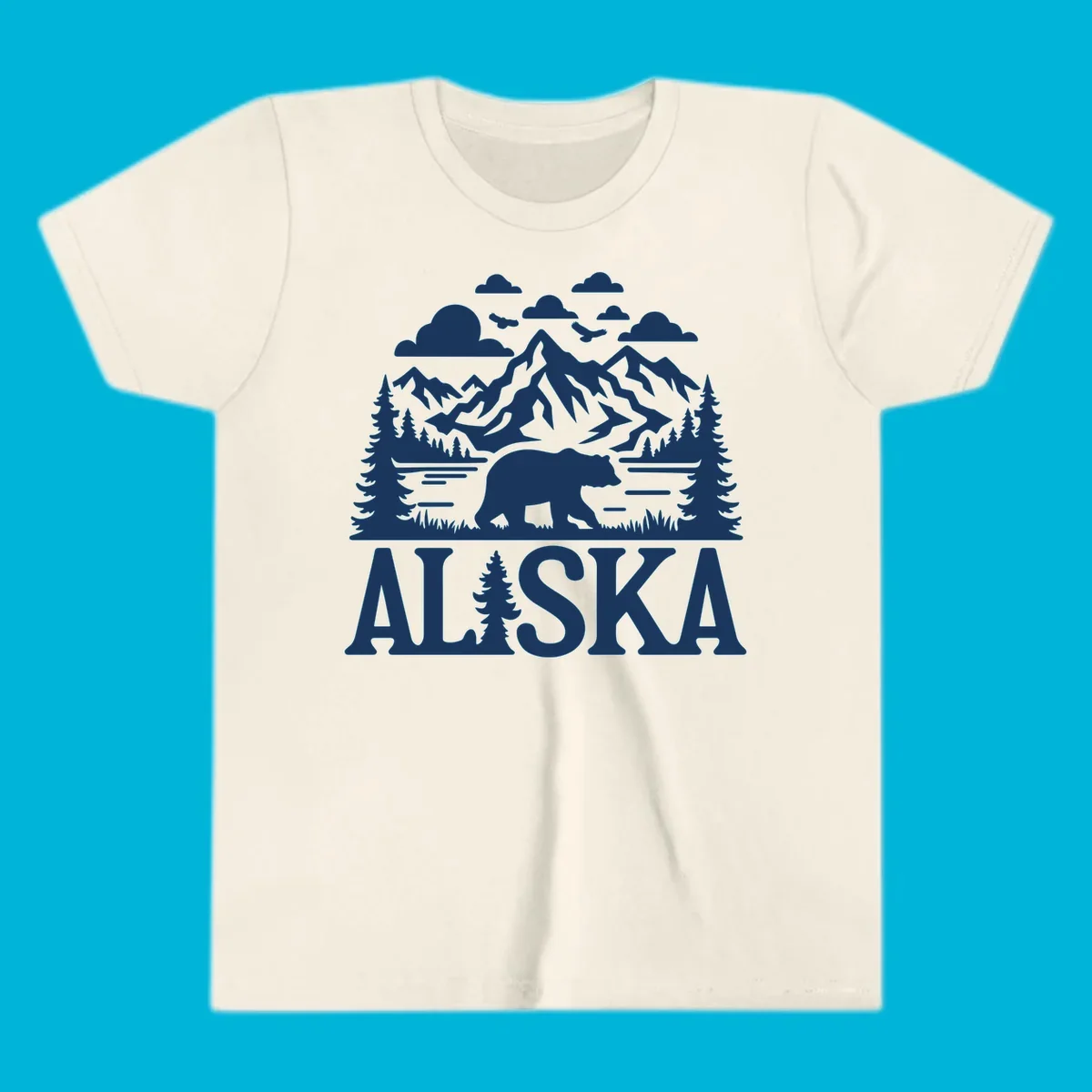 Graphic of an alaska-bear-mountain-view with a bear, mountains, forest, a lake, clouds, and birds, with 'ALASKA' text.