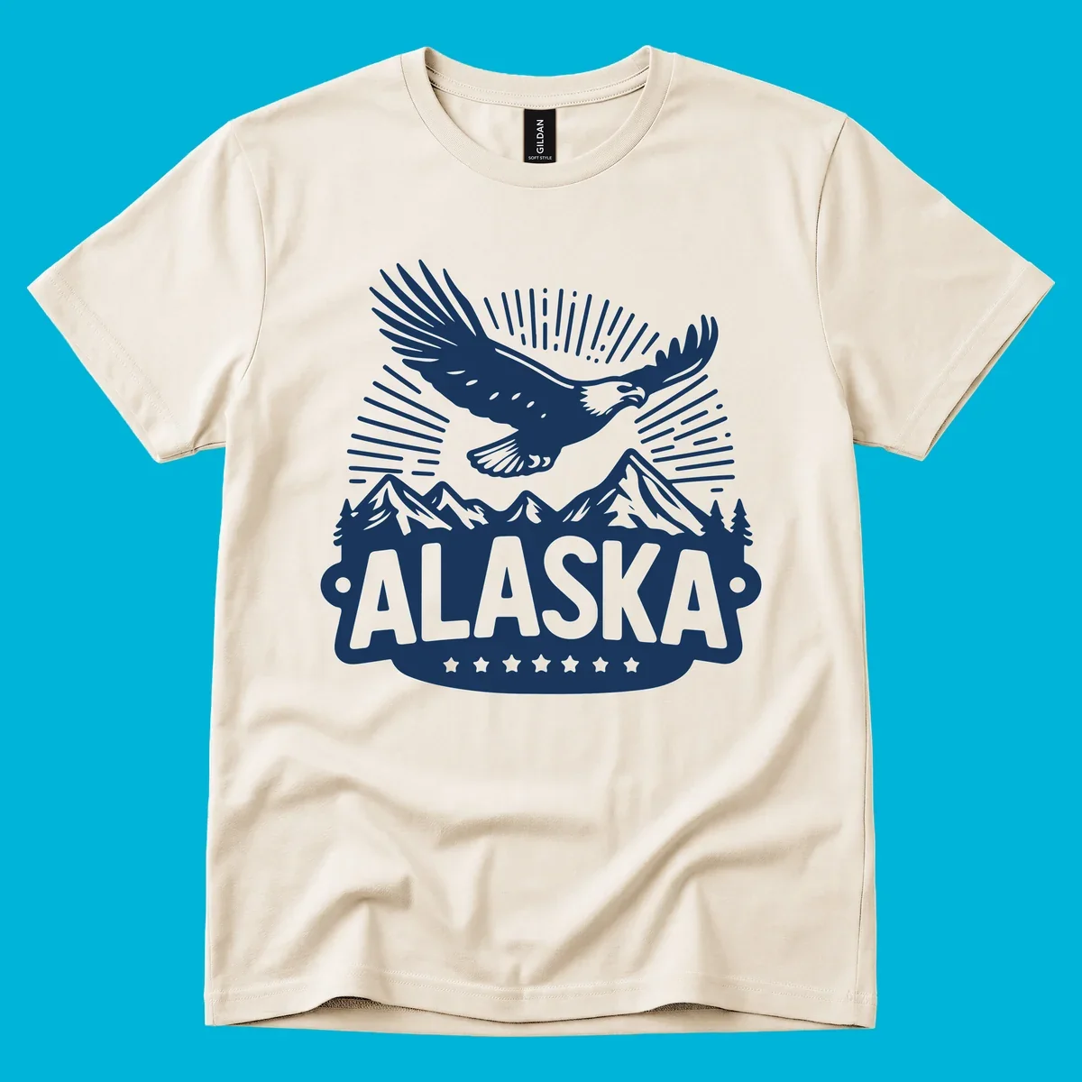 Vintage style Alaska eagle mountain view design with a soaring bald eagle over mountains and pine trees, with ALASKA text.
