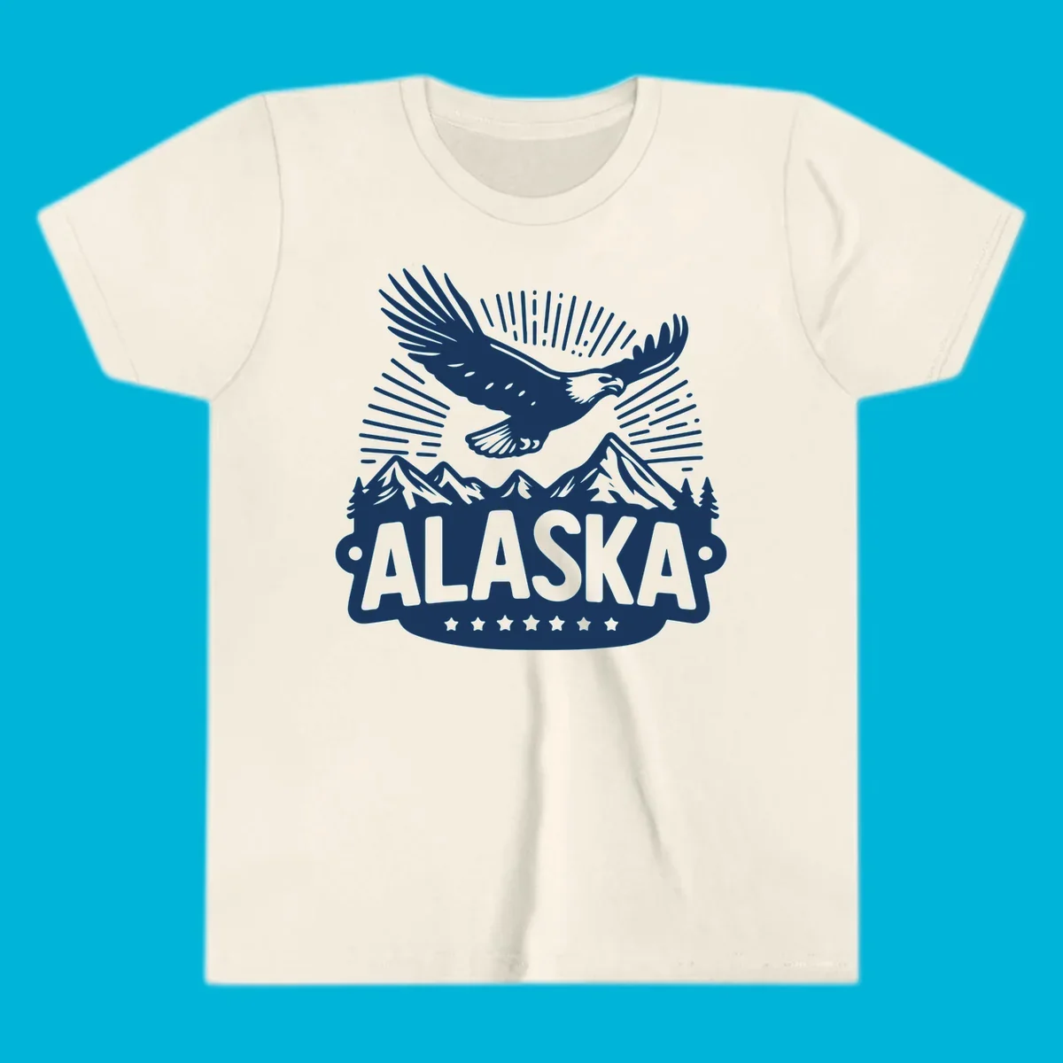 Vintage style Alaska eagle mountain view design with a soaring bald eagle over mountains and pine trees, with ALASKA text.