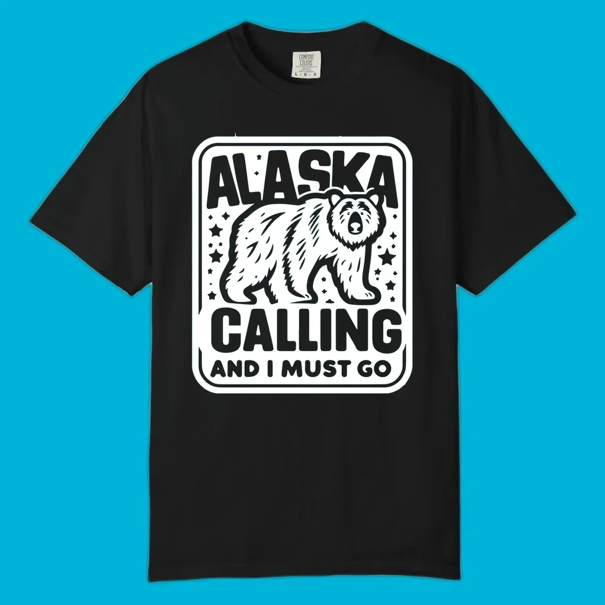 A vintage-style illustration of a bear with stars and the text 'ALASKA CALLING AND I MUST GO'.