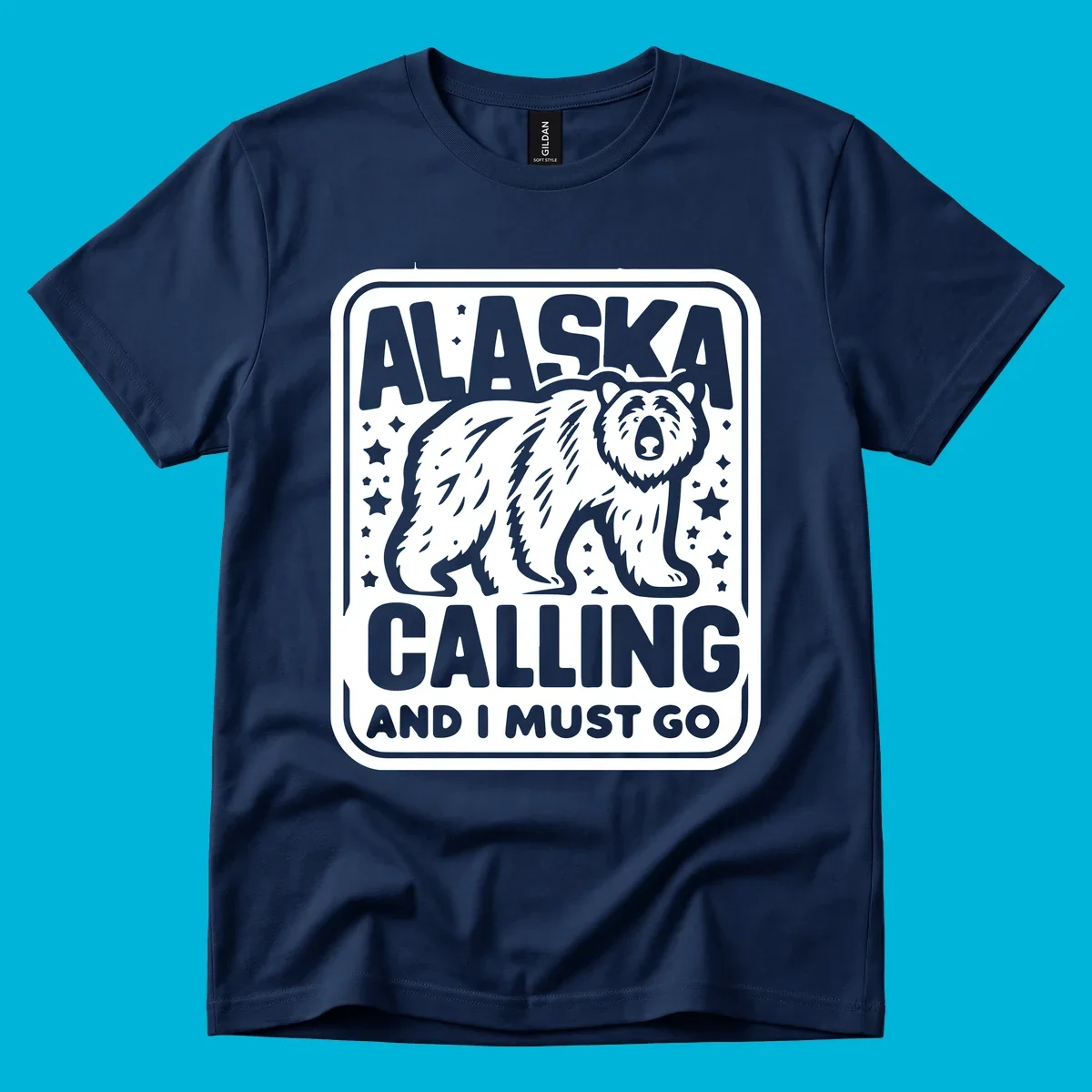 A vintage-style illustration of a bear with stars and the text 'ALASKA CALLING AND I MUST GO'.