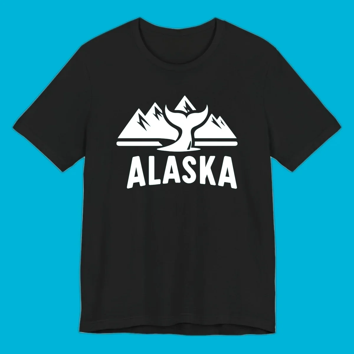A scenic Alaska mountains whale tail design with three peaks and a whale's fluke above the word ALASKA.