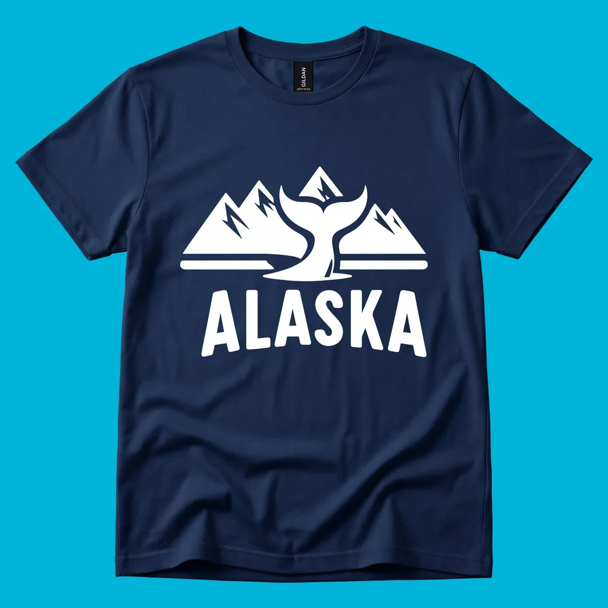 A scenic Alaska mountains whale tail design with three peaks and a whale's fluke above the word ALASKA.