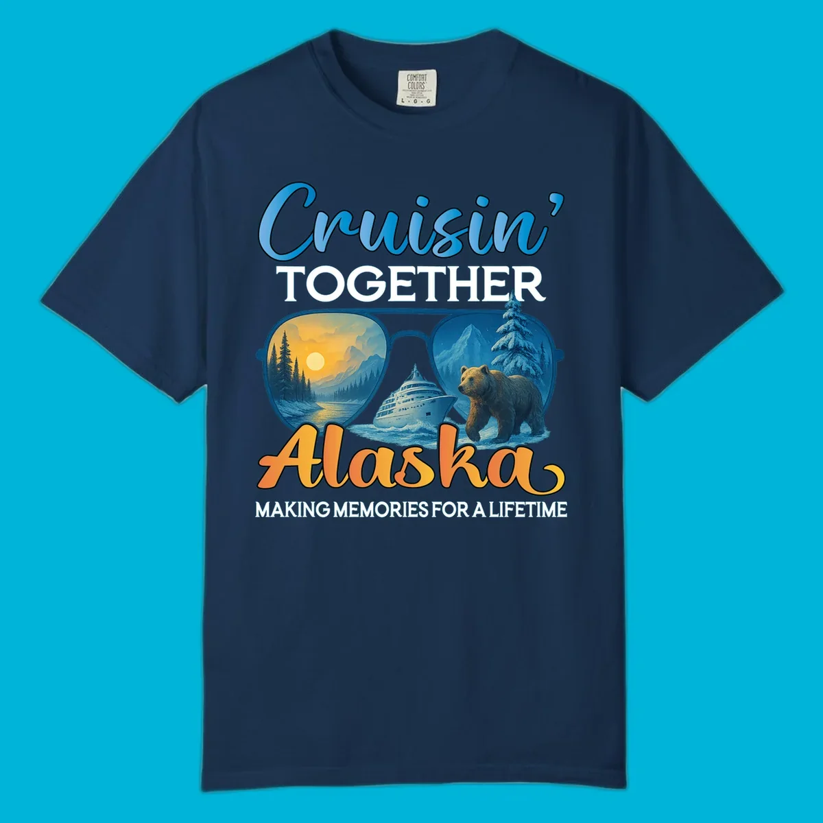 An illustrated design with text 'Cruisin' TOGETHER Alaska MAKING MEMORIES FOR A LIFETIME'. Sunglasses reflect an Alaska cruise scene with a ship, bear, mountains, and sun.