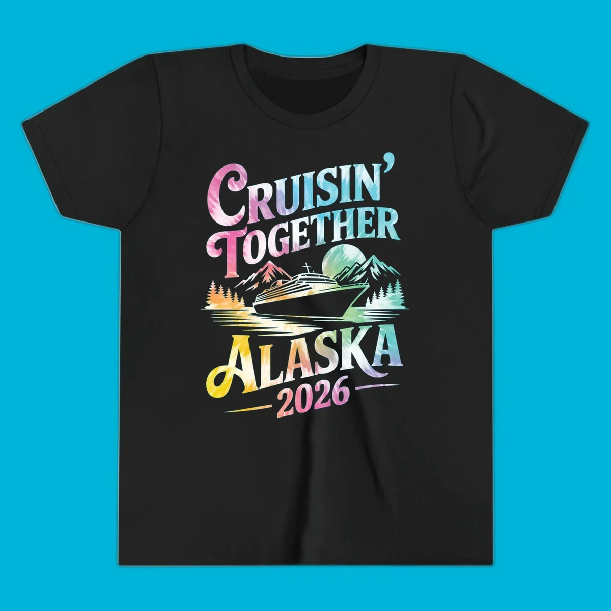 A tie-dye graphic featuring a cruise ship, mountains, and trees, with the text 'CRUISIN' TOGETHER ALASKA 2026'. This alaska-cruise-2026-tie-dye design shows a scenic view.