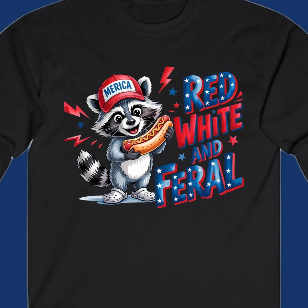 A cartoon raccoon wearing a 'MERICA' hat and holding a hot dog, next to text 'RED WHITE AND FERAL'. This is a raccoon-red-white-feral design.