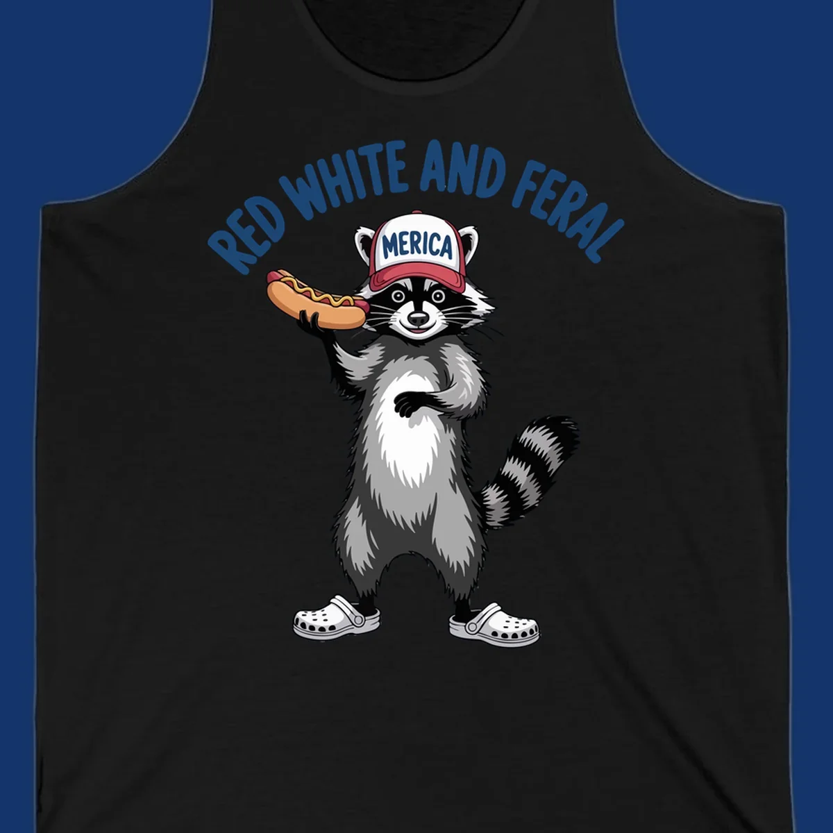 A patriotic raccoon in a MERICA hat and Crocs holds a hot dog, with 'RED WHITE AND FERAL' text. Features the red-white-feral-raccoon concept.